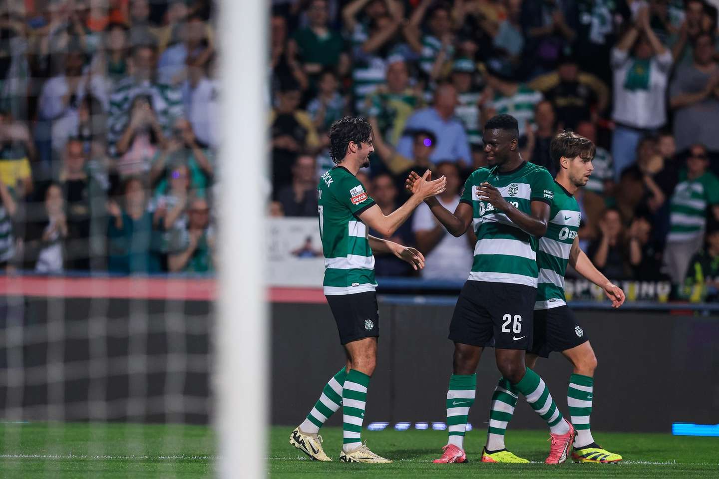 Sporting's Francisco Trincao  (L) celebrates with Osmane Diomande (C) and Daniel Braganca after scoring a goal against Gil Vicente during their Portuguese First League soccer match, Barcelos Municipal stadium, Barcelos, Portugal, 12 April 2024. JOSE COELHO/LUSA