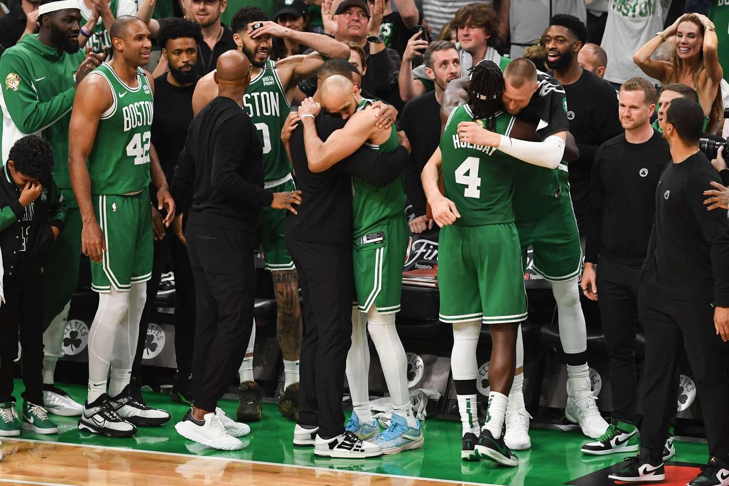 epa11419222 Boston Celtics teammates embrace on the bench in the final minutes against the Dallas Mavericks in the NBA Finals game five in Boston, Massachusetts, USA, 17 June 2024. The Boston Celtics defeated the Dallas Mavericks to win the NBA Finals Championship.  EPA/AMANDA SABGA  SHUTTERSTOCK OUT
