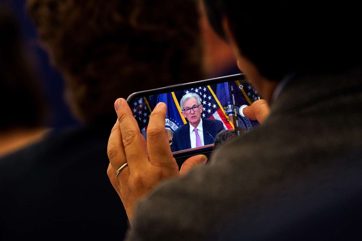 epa11708343 US Federal Reserve Board Chairman Jerome Powell appears on a screen of a mobile phone during a news conference at the Federal Reserve in Washington, DC, USA, 07 November 2024. The US Federal Reserve has announced a cut in interest rates by a quarter of a percentage point.  EPA/WILL OLIVER