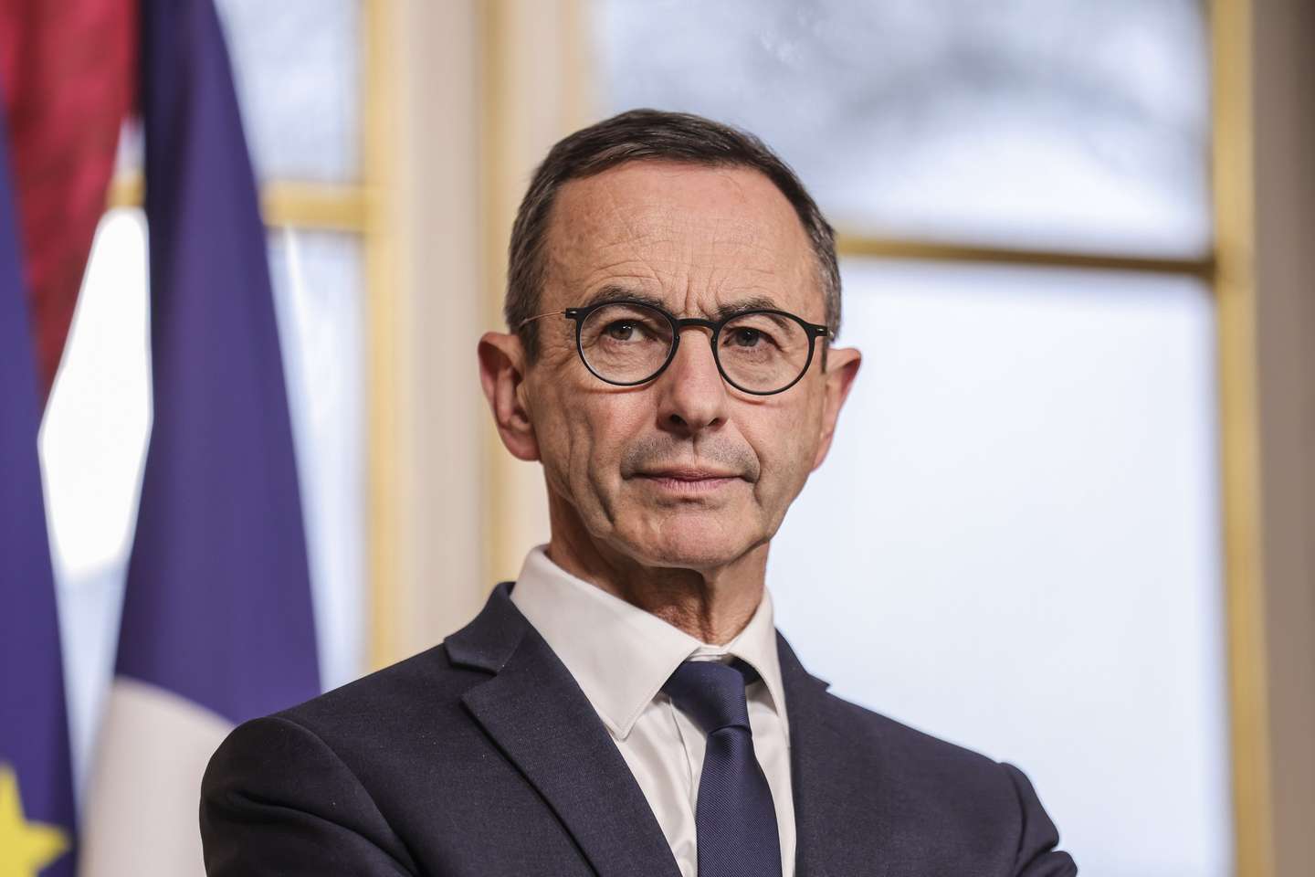 epa11926082 French Interior Minister Bruno Retailleau looks on during the prime minister's speech following a meeting of the Interministerial Committee for Immigration Control (CICI) at the Hotel Matignon in Paris, France, 26 February 2025.  EPA/TERESA SUAREZ