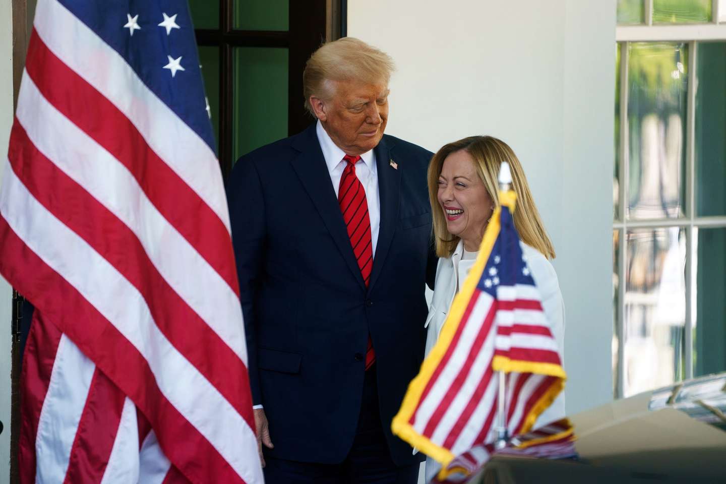 epa12037064 US President Donald Trump (L) greets Italian Prime Minister Giorgia Meloni (R) at the White House, Washington, DC, USA, 17 April 2025.  EPA/WILL OLIVER