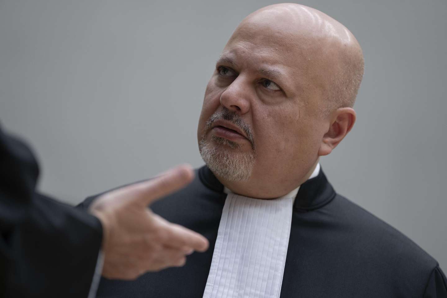 epa11963831 Chief Prosecutor Karim Khan talks while waiting for former Philippine President Rodrigo Duterte to appear via video link in the courtroom of the International Criminal Court (ICC) in The Hague, Netherlands, 14 March 2025. Duterte, who is being held in Scheveningen prison, appears before a pre-trial chamber of the ICC, following his arrest on 11 March in Manila. The ICC is investigating Duterte's war on drugs campaign that resulted in thousands of cases of alleged extra-judicial killings during his term.  EPA/PETER DEJONG / POOL