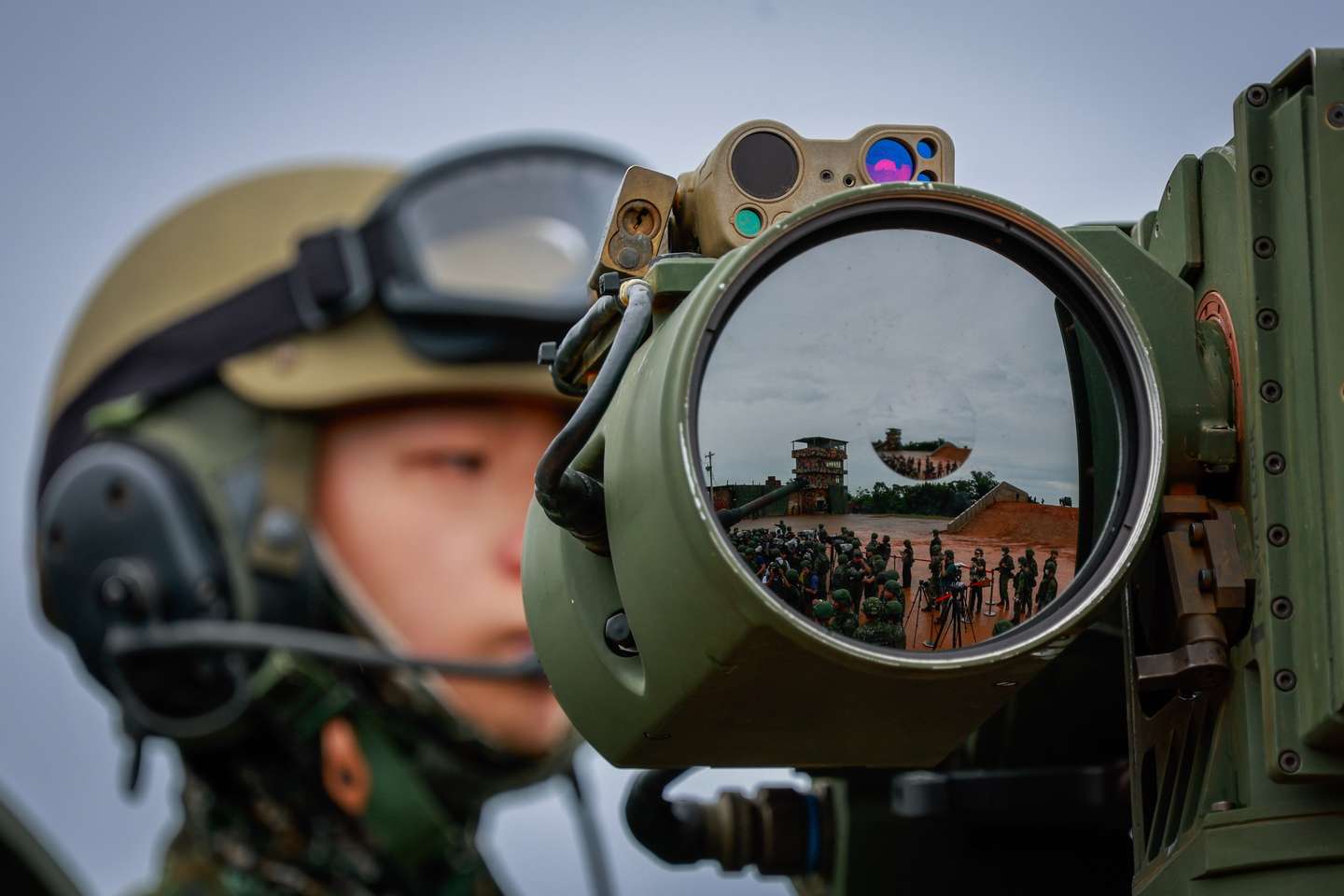 epaselect epa12228270 Taiwanese military personnel participate during the US Made M1A2T tanks live fire drill that coincides with the annual Han Kuang military exercises, in Hsinchu county, Taiwan, 10 July 2025. Taiwanese Armed Forces began the annual Han Kuang exercises, large-scale military drills aimed at testing the troops' defensive capabilities in the event of a potential invasion by China, and are scheduled between 09-18 July.  EPA/RITCHIE B. TONGO