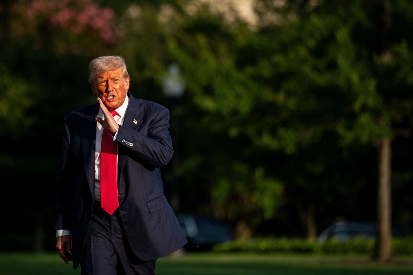 epa12240022 US President Donald Trump walks on the South Lawn of the White House after arriving on Marine One in Washington, DC, USA, 15 July 2025. Trump hailed more than $92 billion US dollars in investments in artificial intelligence and energy infrastructure during a visit to Pennsylvania, highlighting his efforts to bolster US competitiveness in the AI field.  EPA/Al Drago / POOL