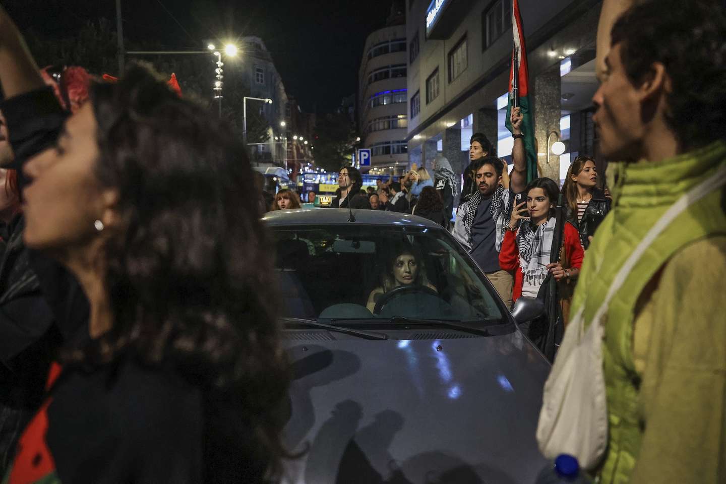Protesters attend a rally in support of the Palestinian people and the Global Sumud Flotilla (GSF) block the road in Porto, Portugal, 02 October 2025. Israeli forces intercepted boats of the Gaza-bound flotilla carrying aid, preventing it from breaching the blockade and reaching the Gaza Strip, according to the Global Sumud Flotilla organizers. ESTELA SILVA/LUSA