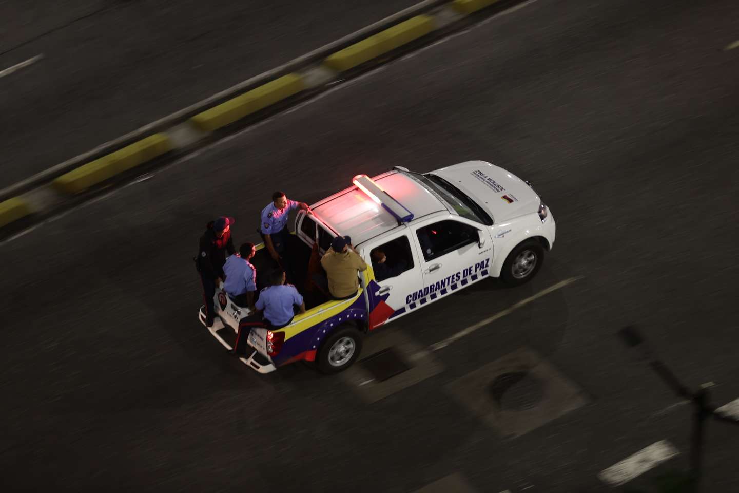 epa12622507 Police forces patrol the streets, most of them without electricity, in Caracas, Venezuela, 03 January 2026, after multiple explosions were reported across the capital. US President Trump announced that the United States has 'successfully captured' Venezuelan leader Nicolas Maduro and his wife, who have been flown out of the country following a series of large-scale military strikes on Caracas. The Venezuelan government has denounced the move, accusing Washington of launching a wave of military attacks against civilian and military targets nationwide.  EPA/RONALD PENA