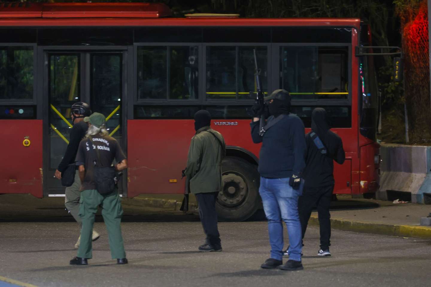 epa12622534 Armed groups guard the entrance to the Cuartel de la Montana (Mountain Barracks) in Caracas, Venezuela, 03 January 2026, after multiple explosions were reported across the capital. US President Trump announced that the United States has 'successfully captured' Venezuelan leader Nicolas Maduro and his wife, who have been flown out of the country following a series of large-scale military strikes on Caracas. The Venezuelan government has denounced the move, accusing Washington of launching a wave of military attacks against civilian and military targets nationwide.  EPA/MIGUEL GUTIERREZ