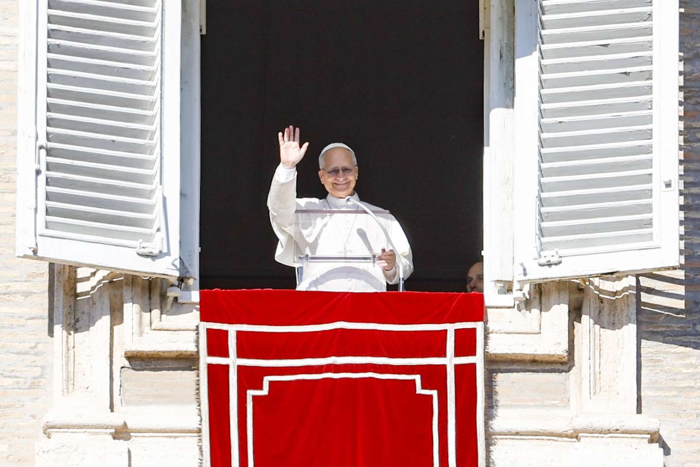 epa12642325 Pope Leo XIV leads the Angelus prayer from the window of his office overlooking Saint Peter's Square, in Vatican City, 11 January 2026.  EPA/FABIO FRUSTACI