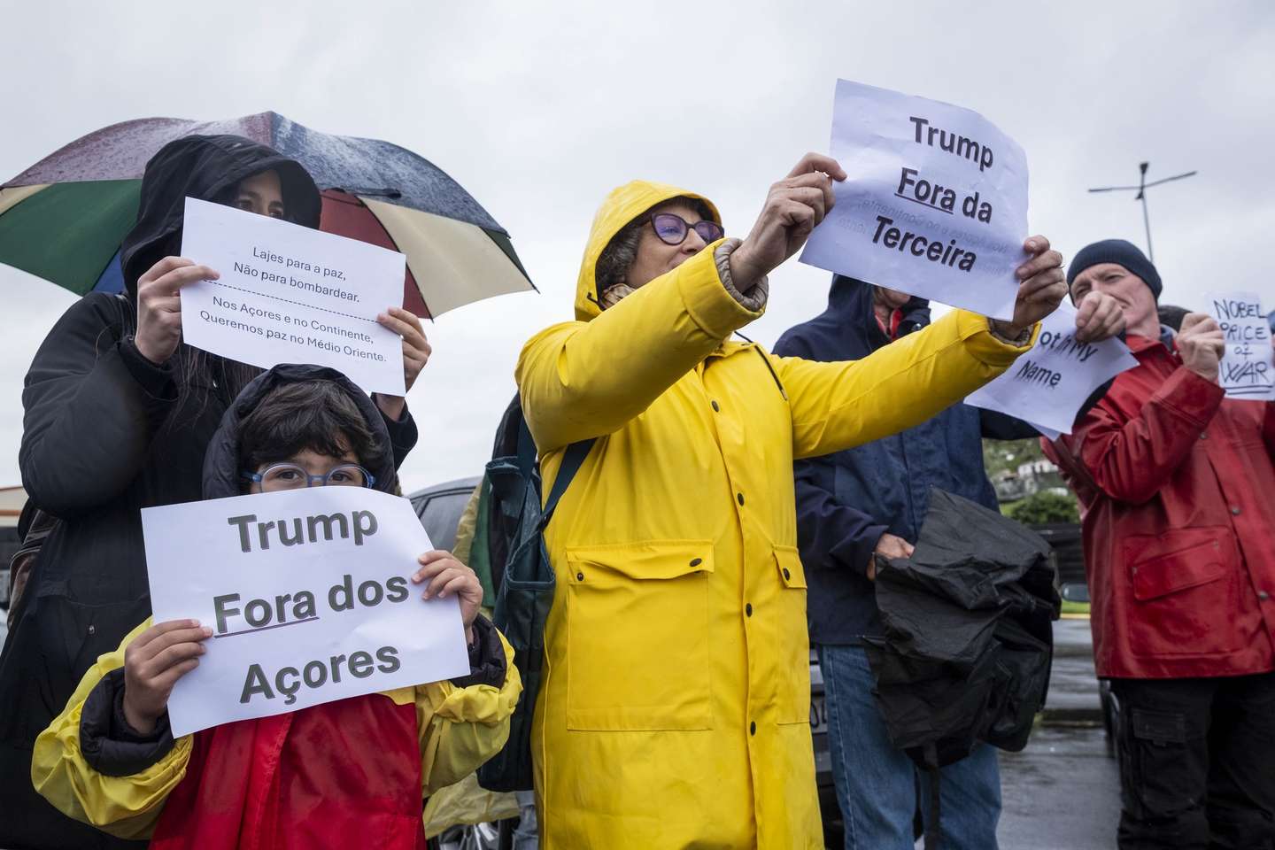 People shout slogans during a protest against the use of Lajes Air Base as a platform for military operations related to the United States and Israel's attack on Iran, Post 1, Lajes Air Base, Praia da Vitória, Terceira, Azores, Portugal, 07 March 2026. ANTONIO ARAUJO/LUSA