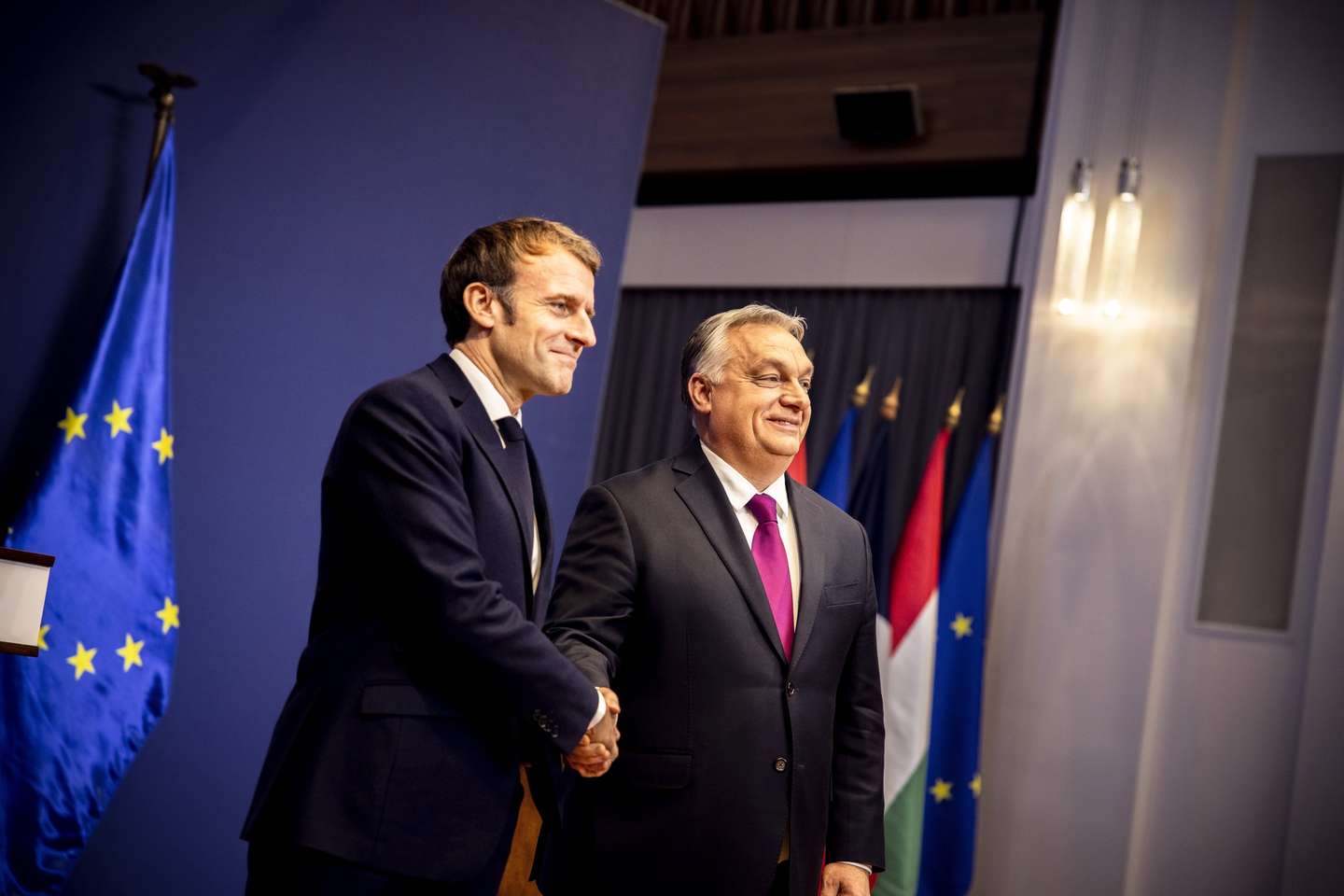 epa09640206 A handout photo made available by the Hungarian Prime Minister's Press Office shows Hungarian Prime Minister Viktor Orban (R) shaking hands with French President Emmanuel Macron (L) after their meeting at the Hungarian Prime Minister's Office in Budapest, Hungary, 13 December 2021.  EPA/Zoltan Fischer HANDOUT  HANDOUT EDITORIAL USE ONLY/NO SALES