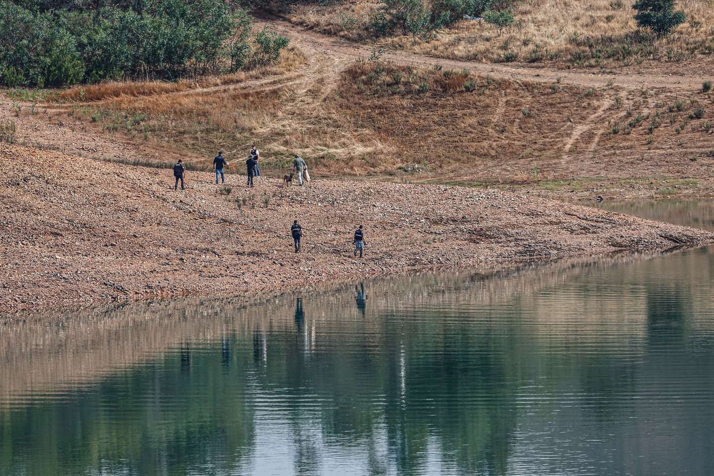 Portuguese authorities from the Judicial Police (PJ) criminal investigation unit on the new search operation amid the investigation into the disappearance of Madeleine McCann in the Arade dam area, in Silves, Faro district, Portugal, 23 May 2023. This operation stems from a European Investigation Order (the old rogatory letters) addressed by the German authorities to Portugal and focuses on the Arade dam, located about 50 kilometers from Praia da Luz, the place where the child disappeared in May 2007, 16 years ago, while on vacation with her parents. LUIS FORRA/LUSA