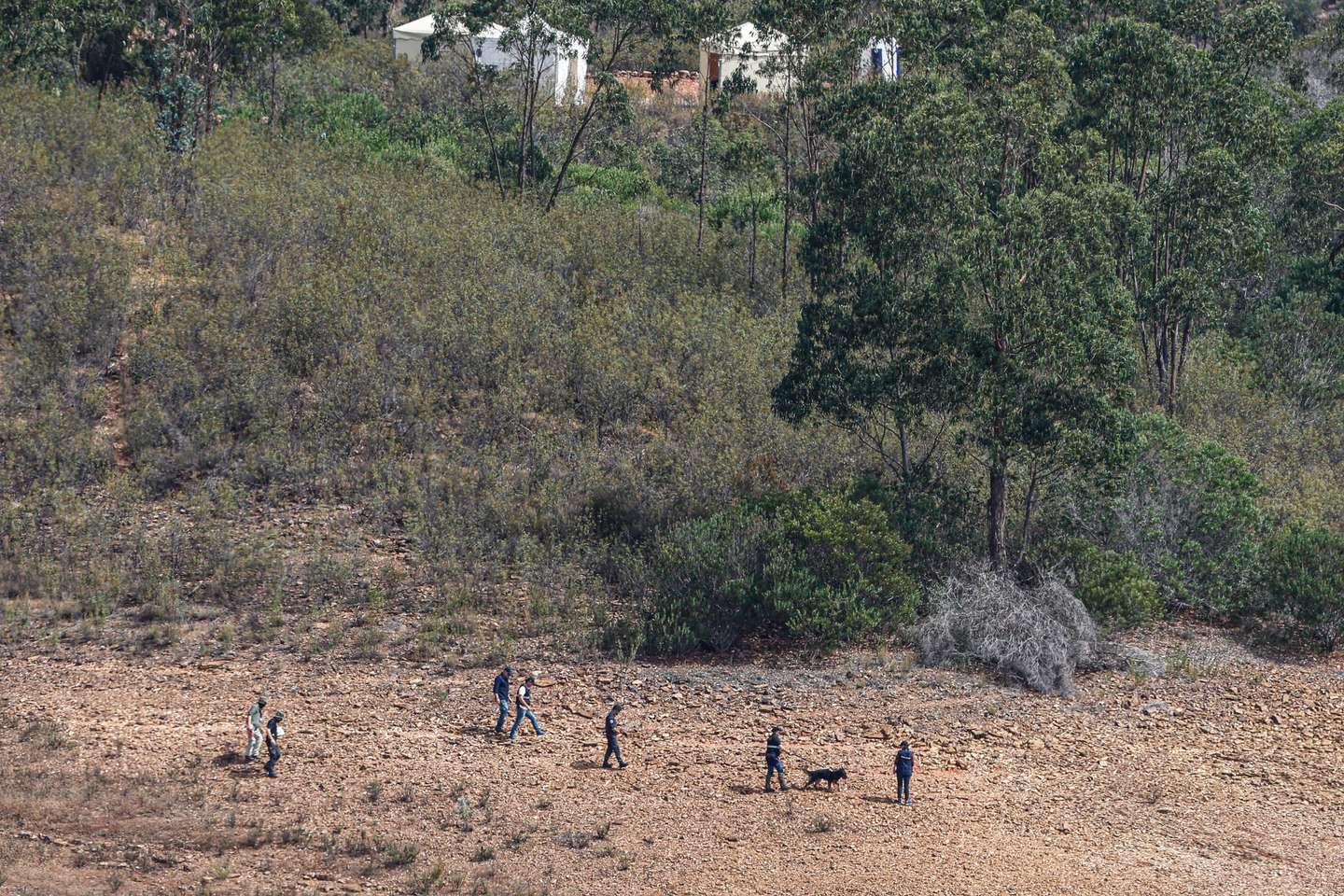 Portuguese authorities from the Judicial Police (PJ) criminal investigation unit on the new search operation amid the investigation into the disappearance of Madeleine McCann in the Arade dam area, in Silves, Faro district, Portugal, 23 May 2023. This operation stems from a European Investigation Order (the old rogatory letters) addressed by the German authorities to Portugal and focuses on the Arade dam, located about 50 kilometers from Praia da Luz, the place where the child disappeared in May 2007, 16 years ago, while on vacation with her parents. LUIS FORRA/LUSA