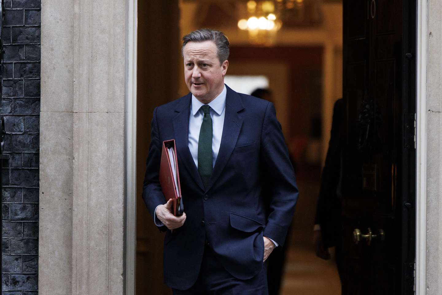 epa11098346 British Foreign Secretary and former Prime Minister, David Cameron, leaves Downing Street after a UK government cabinet meeting in London, Britain, 23 January 2024.  EPA/TOLGA AKMEN