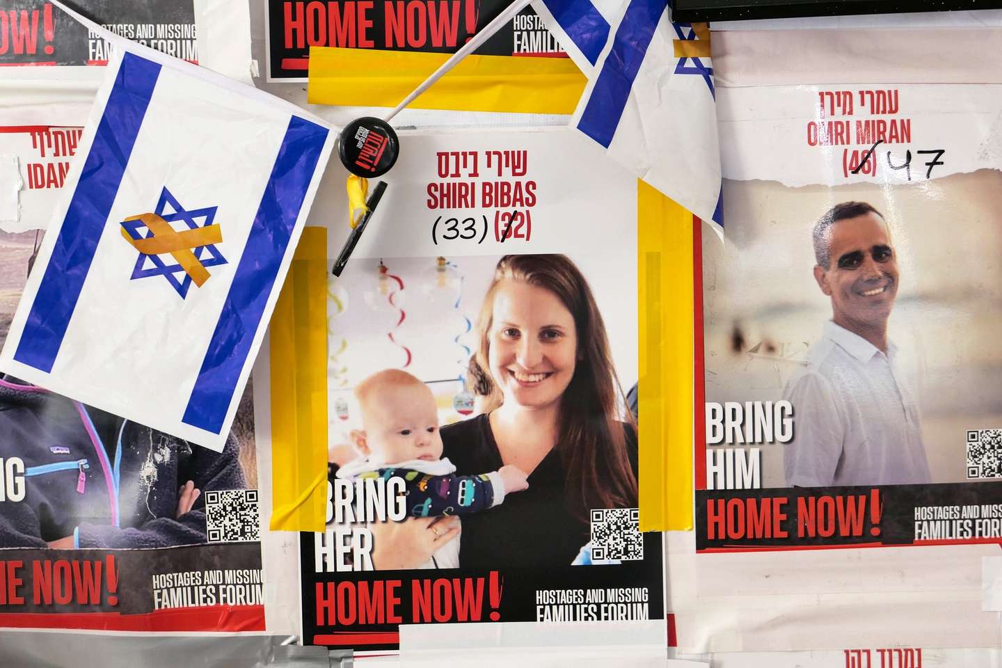 epaselect epa11906493 A poster of Israeli hostage Shiri Bibas at a protest camp of hostages' families near Prime Minister Netanyahu's residence in Jerusalem, 19 February 2025. Hamas announced that the bodies of Shiri Bibas and her toddler sons, Ariel and Kfir, along with another dead hostage, would return to Israel in coffins on 20 February. According to Israel's military, around 100 Israeli hostages remain in captivity in the Gaza Strip, including the bodies of at least 33 confirmed dead.  EPA/ABIR SULTAN