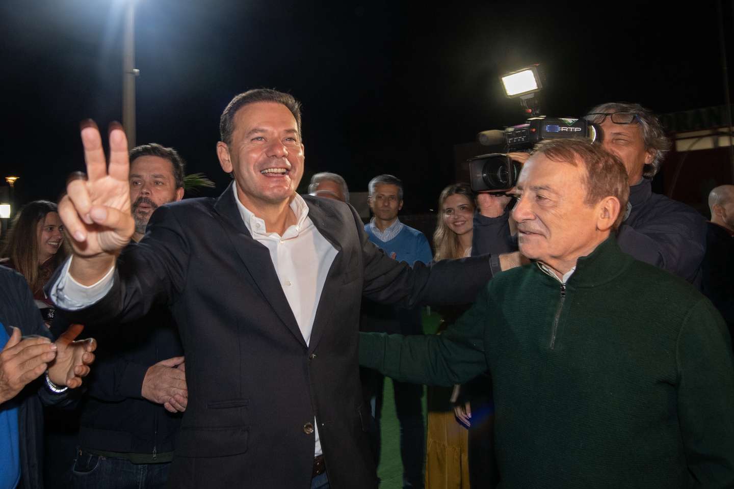 Portuguese Prime Minister and President of the Social Democratic Party (PSD), Luís Montenegro (L), and celebrates with the candidate of the PSD Vila Nova de Gaia City Council, Luís Filipe Menezes (R), on election night for the local elections at party headquarters in Porto, Portugal, 13 October 2025. More than 9.3 million electors can vote in the local elections in Portugal on 12 October 2025. RUI MANUEL FARINHA/LUSA