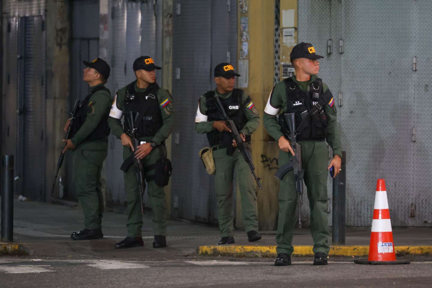 epa12622503 Military personnel guard the perimeter of the Miraflores Presidential Palace in Caracas, Venezuela, 03 January 2026, after multiple explosions were reported across the capital. US President Trump announced that the United States has 'successfully captured' Venezuelan leader Nicolas Maduro and his wife, who have been flown out of the country following a series of large-scale military strikes on Caracas. The Venezuelan government has denounced the move, accusing Washington of launching a wave of military attacks against civilian and military targets nationwide.  EPA/MIGUEL GUTIERREZ
