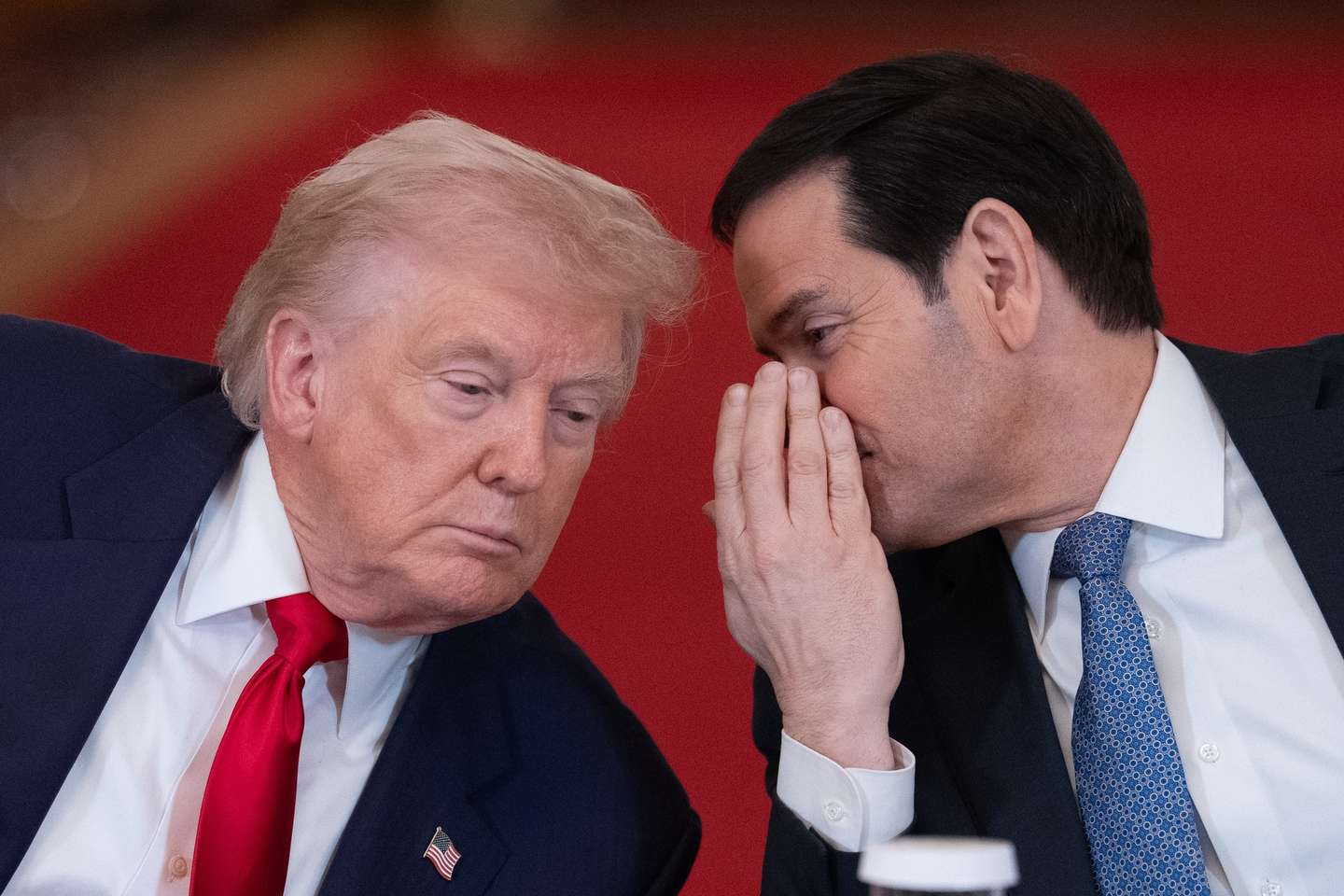 epa12800601 US President Donald Trump (L) listens to US Secretary of State Marco Rubio (R) during a 'Saving College Sports' roundtable in the East Room of the White House in Washington, DC, USA, 06 March 2026. A new council that will explore ways to overhaul college sports is expected to discuss a potential antitrust exemption, a policy change the National Collegiate Athletic Association has sought to protect itself from legal challenges to player compensation rules.  EPA/AARON SCHWARTZ / POOL
