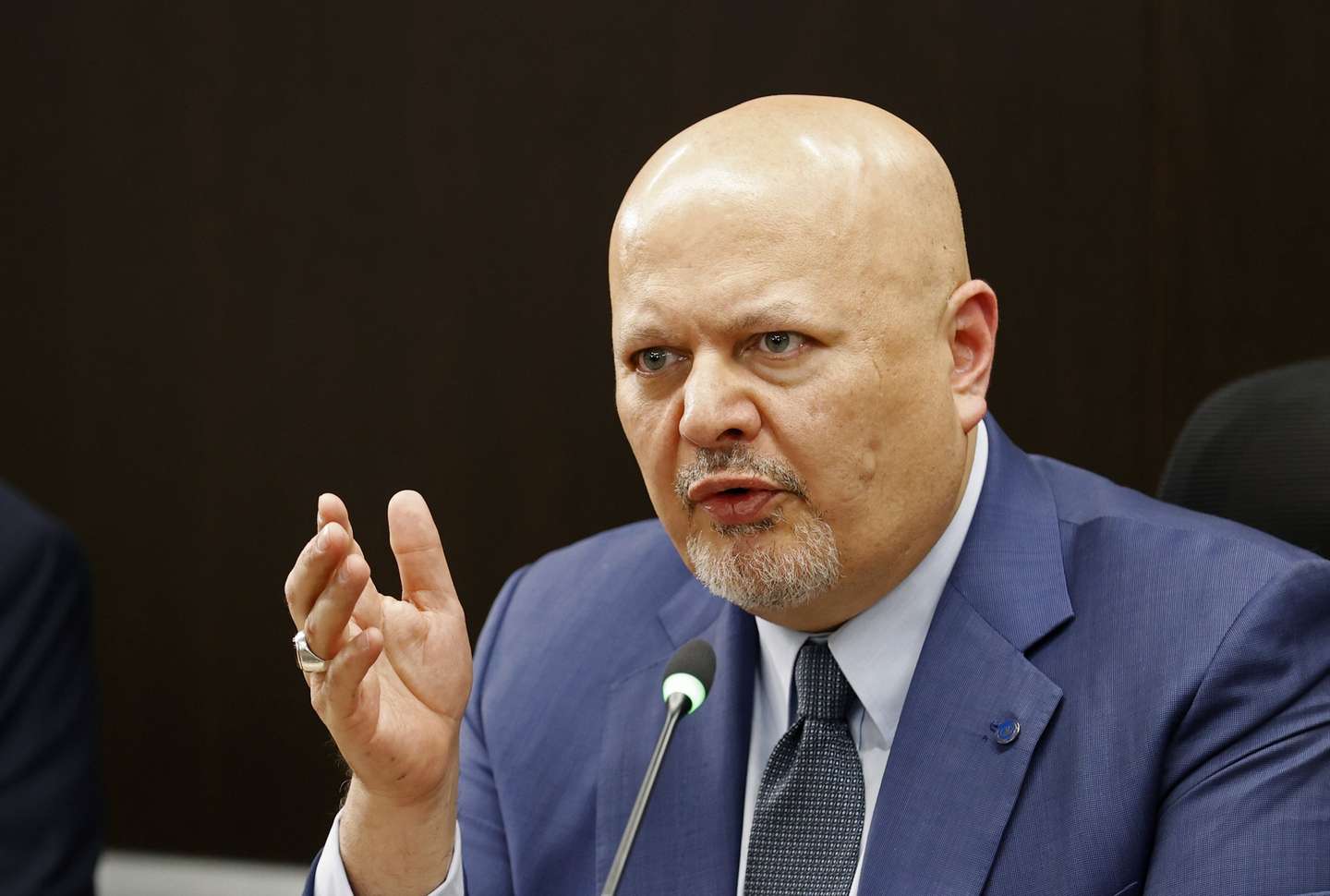 epa10676678 The prosecutor of the International Criminal Court (ICC), Karim Khan, meets with the president of the JEP, magistrate Roberto Vidal (out of frame), at the headquarters of the Special Jurisdiction for Peace (JEP) in Bogota, Colombia, 06 June 2023. Khan, who is visiting Colombia for the second time, recognized the Latin American country as an example of the Transitional Justice model. Khan's visit began this Monday with a meeting that he held with President Gustavo Petro and his agenda will continue this Wednesday with his participation in the panel "Roadmap to justice in Colombia" organized by the Foreign Ministry.  EPA/Mauricio Duenas Castaneda