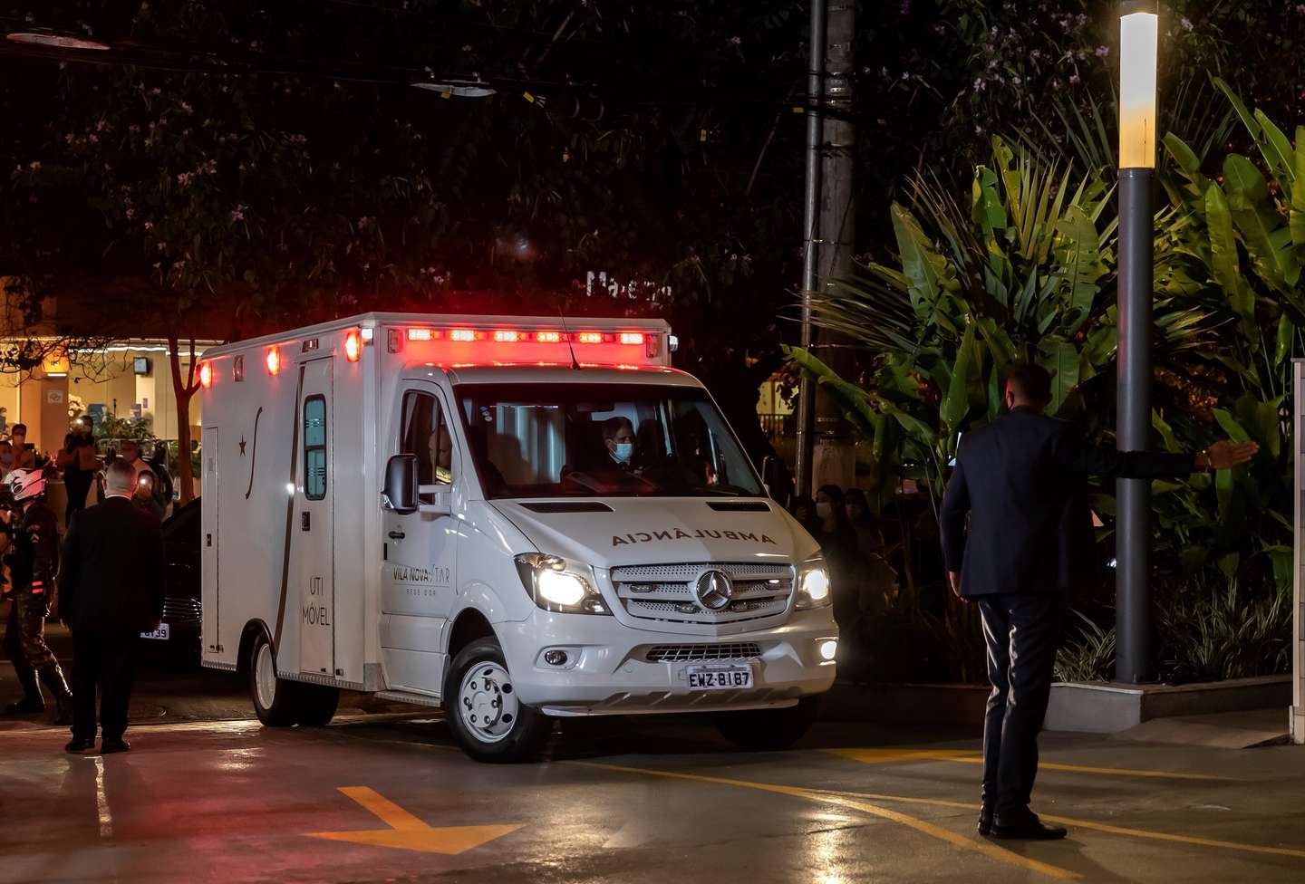 epa09345092 An ambulance transfers the president of Brazil, Jair Bolsonaro, to the Vila Nova Star Hospital, in Sao Paulo, Brazil, 14 July 2021. Brazilian President Jair Bolsonaro arrived in Sao Paulo from Brasilia to assess whether he should undergo an 'emergency' surgery for an 'intestinal obstruction,' official sources reported.  EPA/Sebastiao Moreira