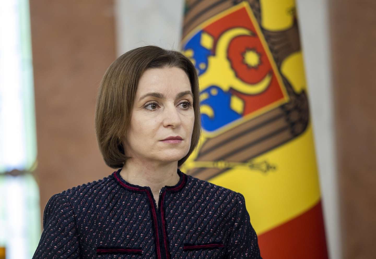 epa10459417 Moldova's President Maia Sandu attends a joint press briefing with Parliament President Igor Grosu and prime minister nominee Dorin Recean at the presidential building in Chisinau, Moldova, 10 February 2023. The president of Moldova named Dorin Recean as candidate to the premiership of the country hours after Natalia Gavrilita resigned from the post.  EPA/DUMITRU DORU