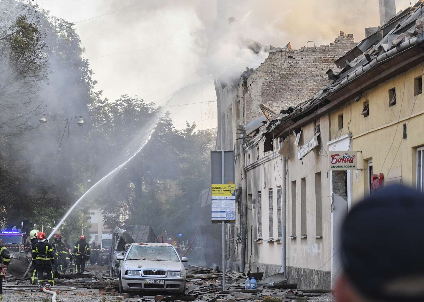 epa11583442 Ukrainian rescuers work at the site of a combined Russian strike that hit a residential area in Lviv, western Ukraine, 04 September 2024, amid the ongoing Russian invasion. At least seven people died, including three children, and 35 others were injured as a result of a Russian combined attack by shock drones and rockets of different types in Lviv, according to Lviv Mayor Andriy Sadovy. Russian troops entered Ukrainian territory on 24 February 2022, starting a conflict that has provoked destruction and a humanitarian crisis.  EPA/MYKOLA TYS
