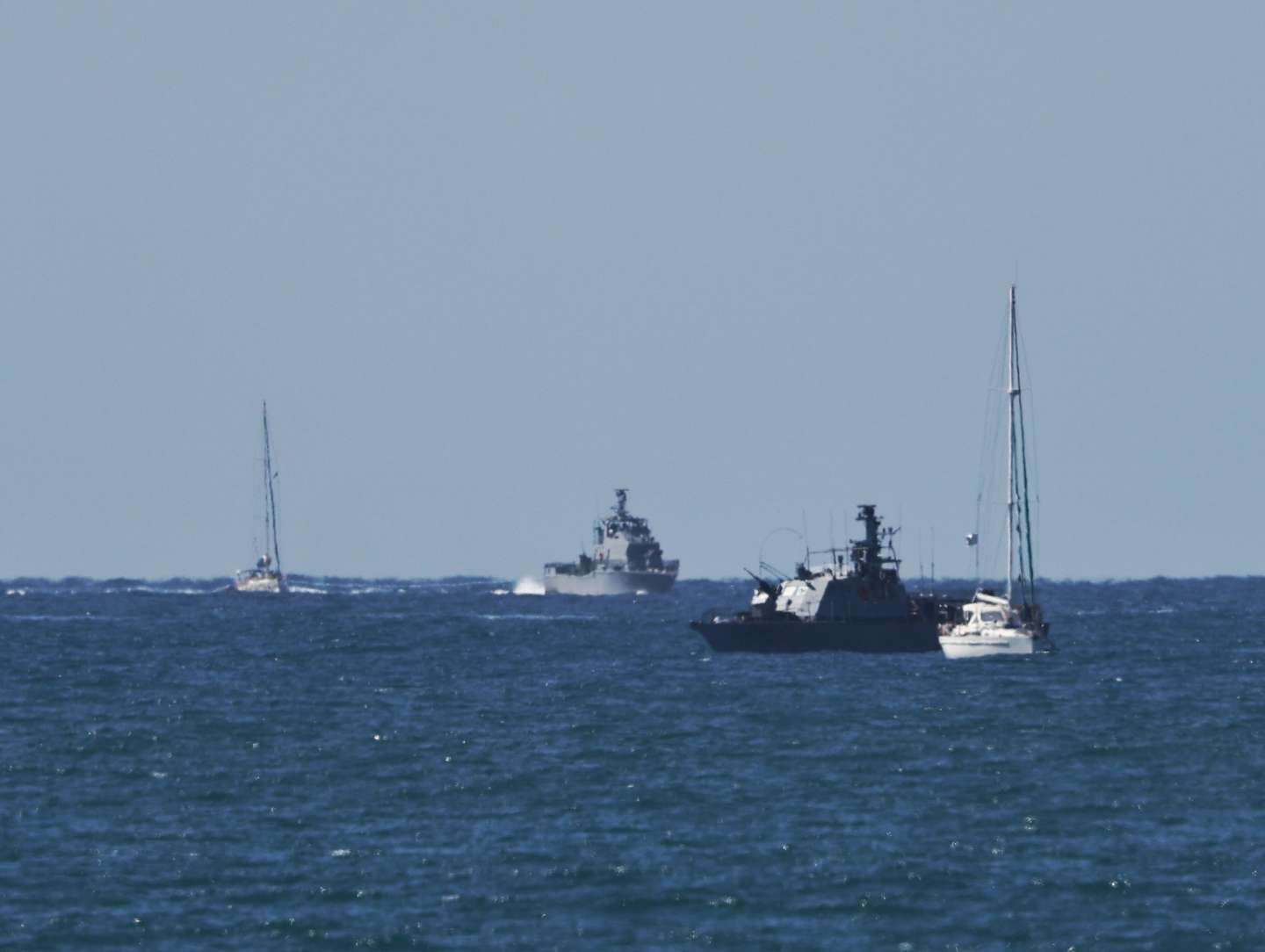 epa12423140 Vessels of the Global Sumud Flotilla arriving at Ashdod port 02 October 2025 after being  intercepted whilst carrying aid to Gaza. Israel's Foreign Ministry announced that several vessels that form part of the Global Sumud Flotilla (GSF) had been stopped and that those aboard were being transferred to an Israeli port.  EPA/ATEF SAFADI
