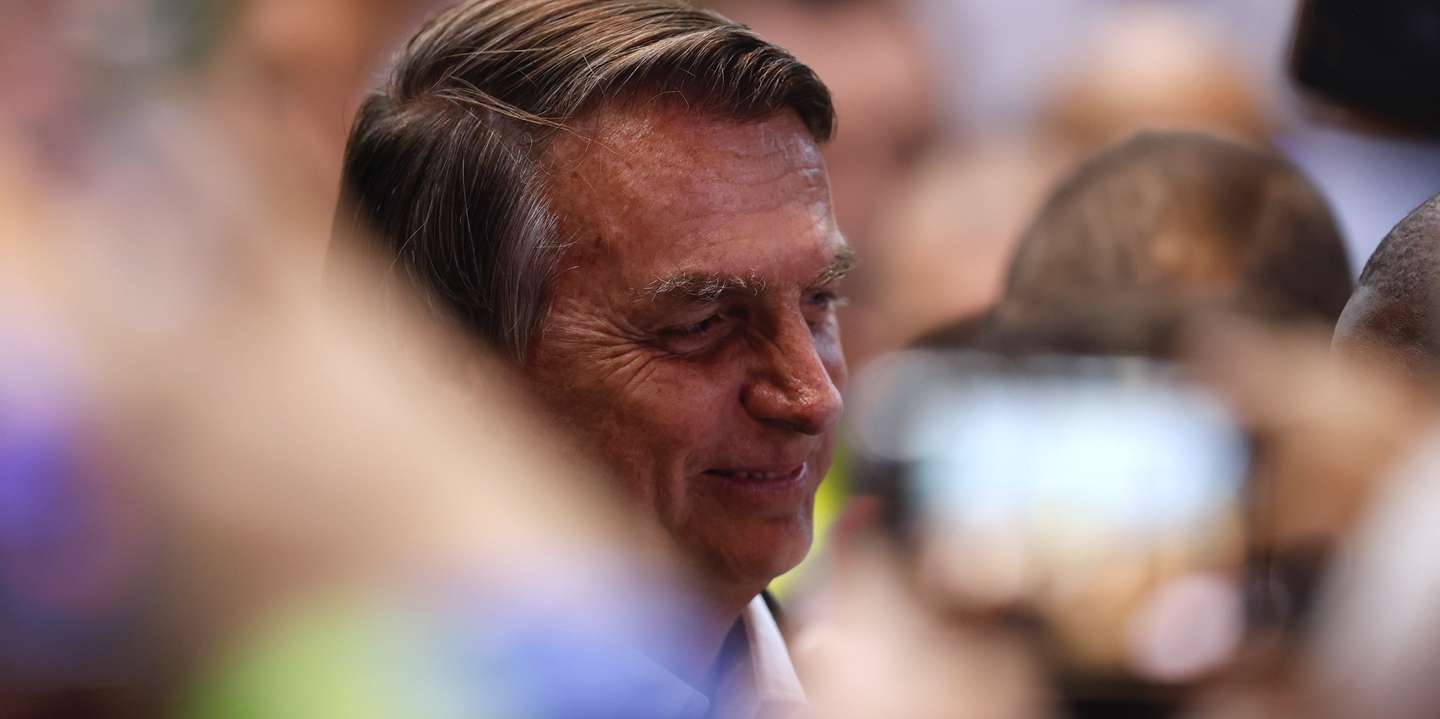 epa10255792 Brazilian President Jair Bolsonaro smiles during a campaign rally in Sao Paulo, Brazil, 20 October 2022. The presidential runoff between Bolsonaro and former President Luiz Inacio Lula da Silva will take place on 30 October.  EPA/Fernando Bizerra