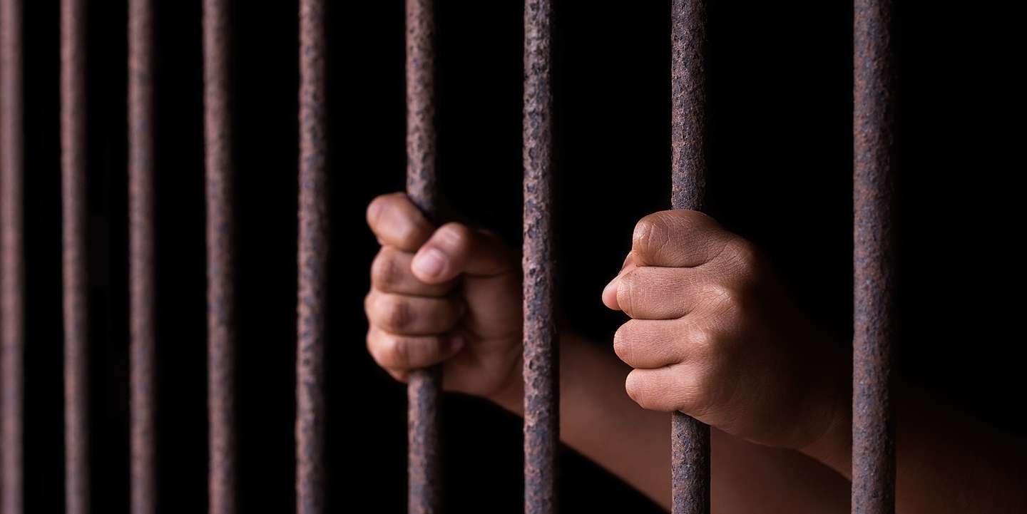 Boy hold cage with eye sad and hopeless