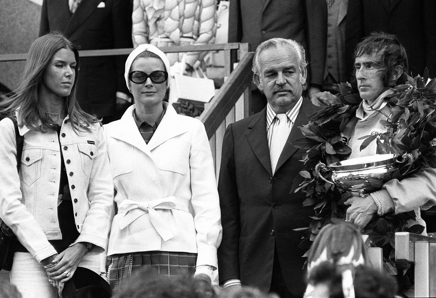 Jackie Stewart (R), triple Formula One c