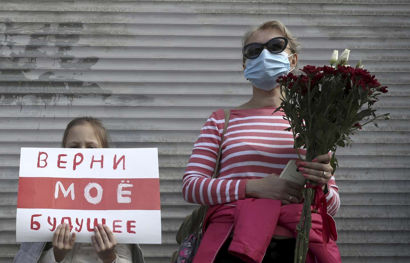 Opposition supporters gather outside Belarusian Embassy in Moscow