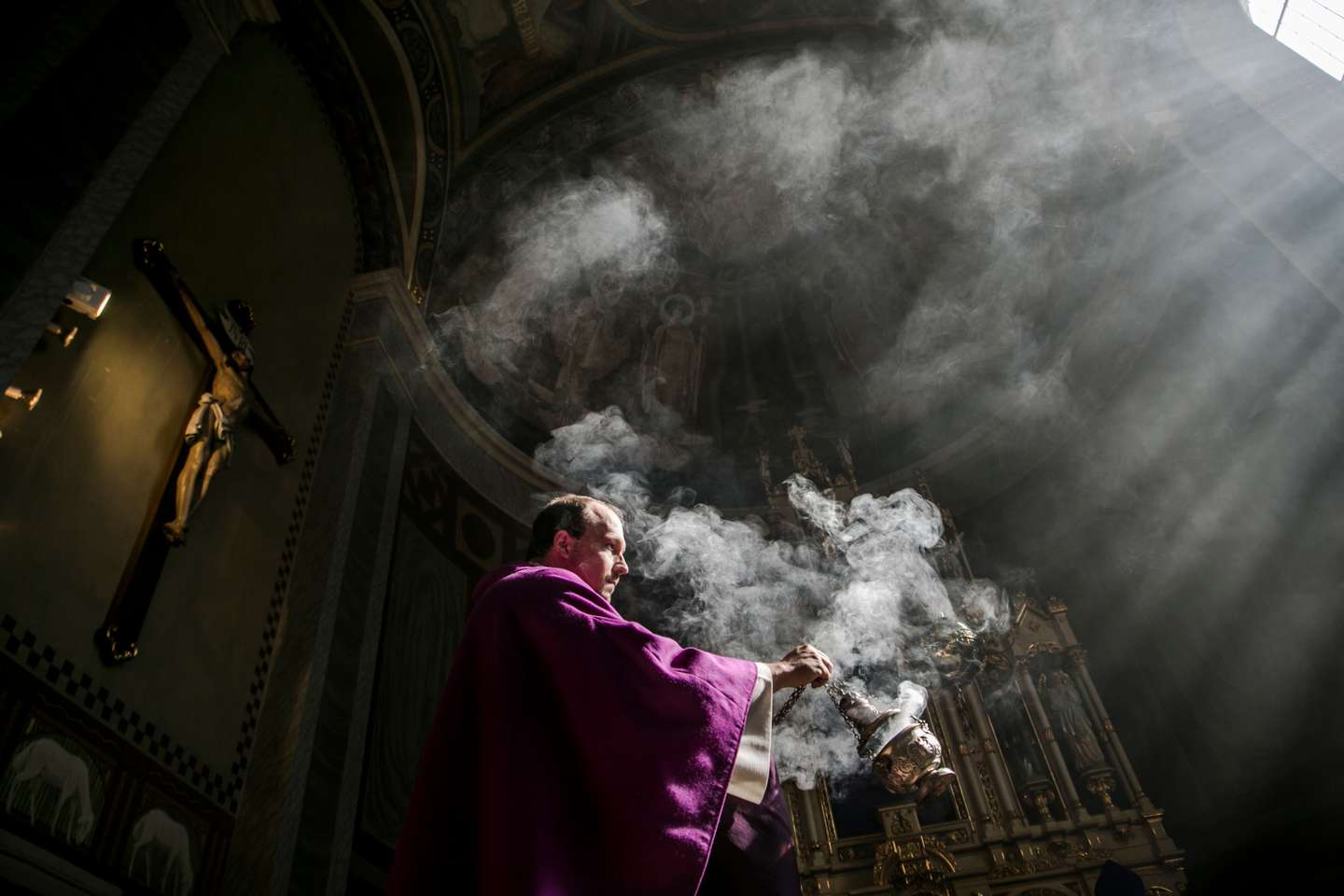 Austrian Priest Holds Daily Mass, His Congregation Represented By Photos