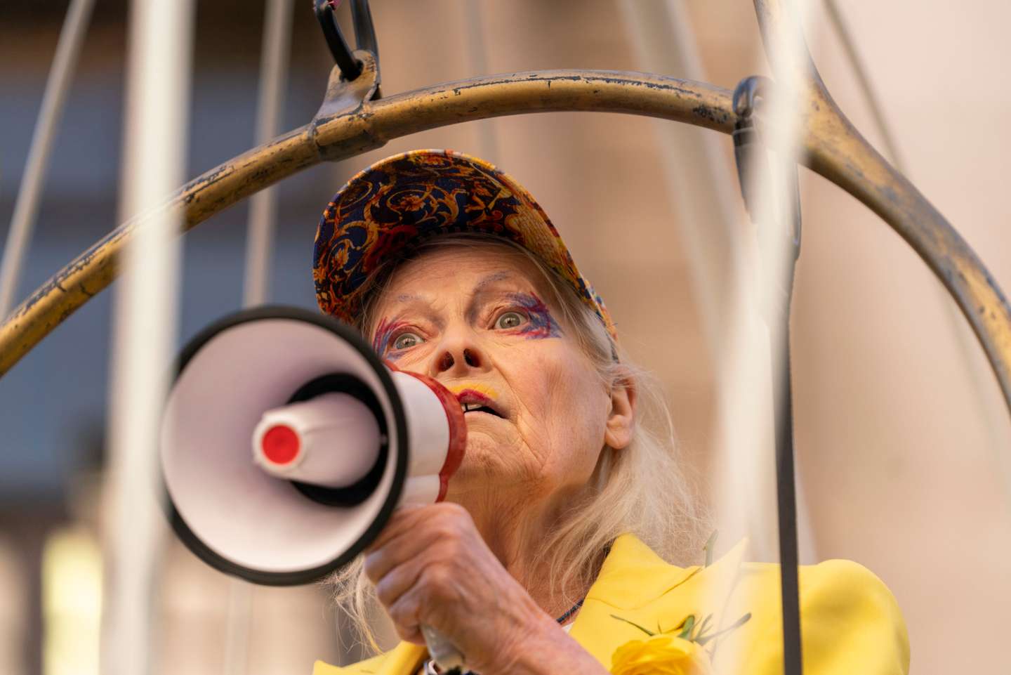 Dame Vivienne Westwood Suspends 10 Ft High Inside Giant Bird Cage In Protest For Julian Assange