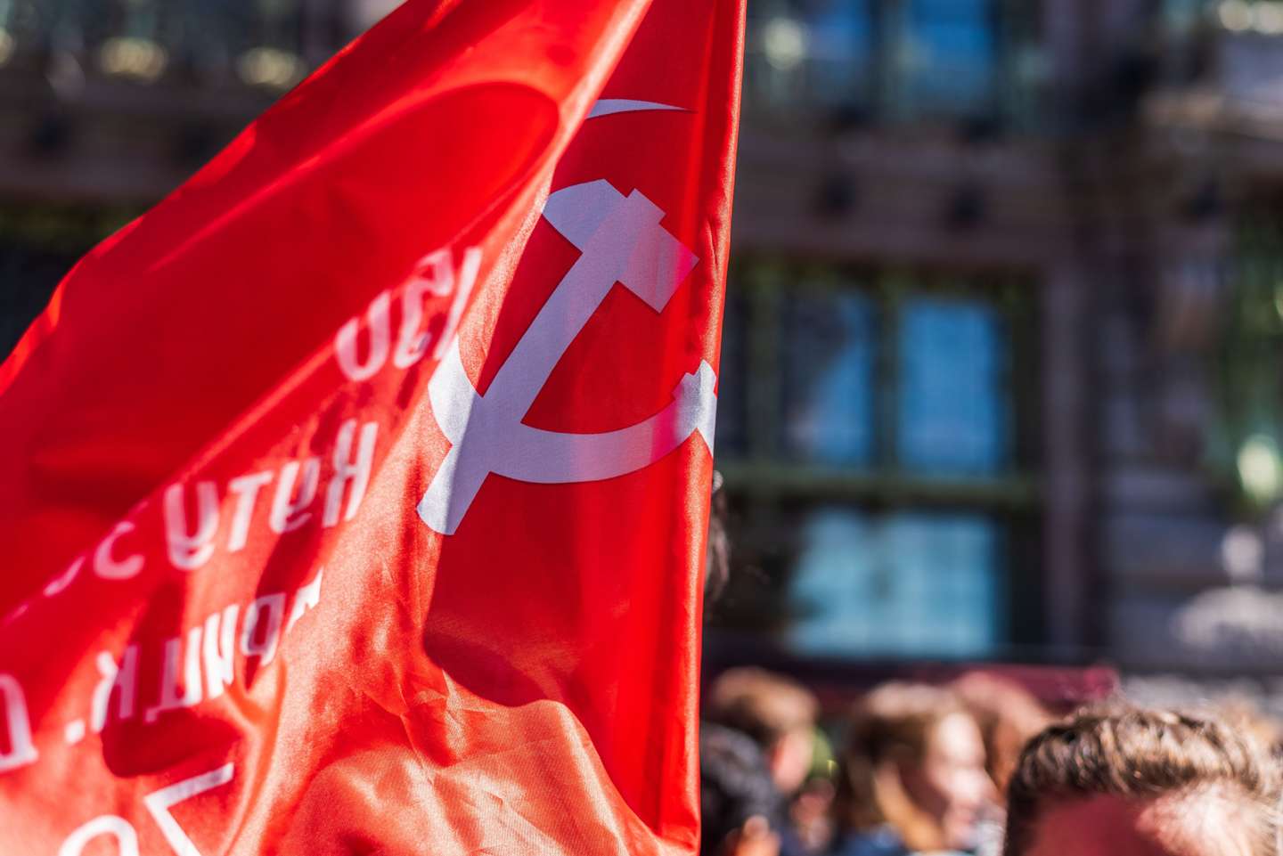 Immortal regiment, people carry communist flag, Victory Day, Nevsky Prospect, St Petersburg, Russia