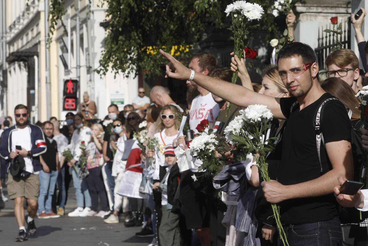 Opposition supporters gather outside Belarusian Embassy in Moscow