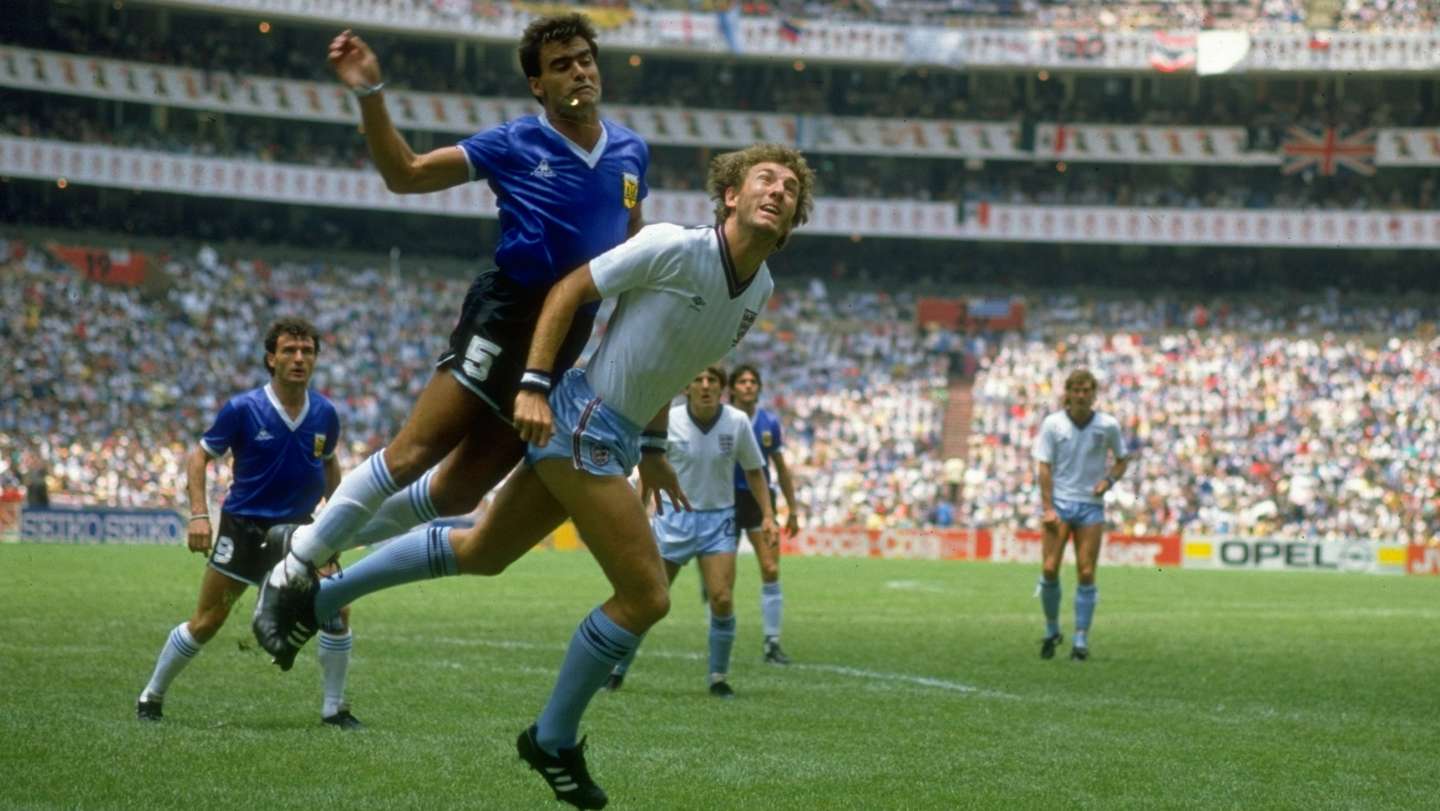 Terry Butcher of England and Jose-Luis Brown of Argentina