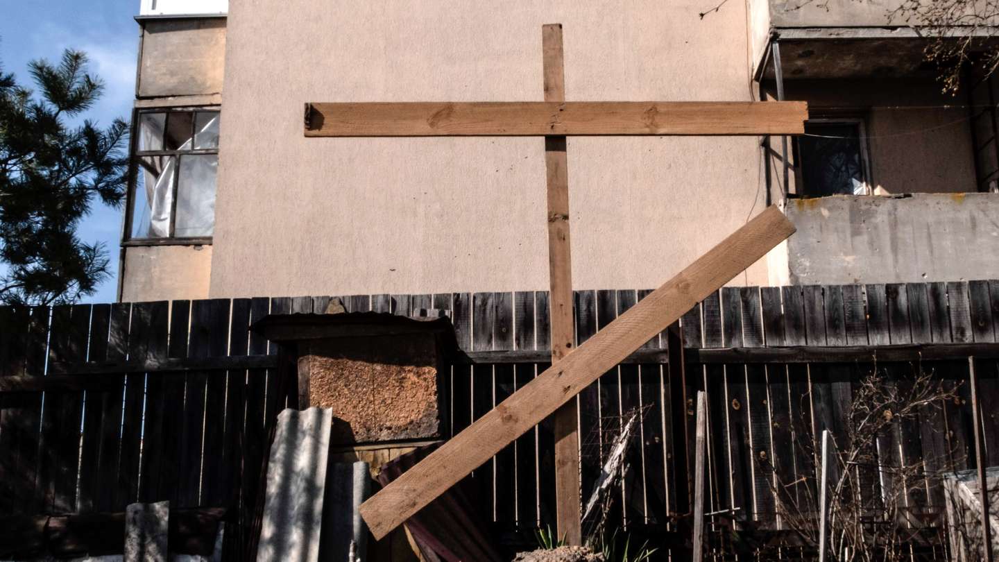 A grave of a man killed by the Russian army was buried in