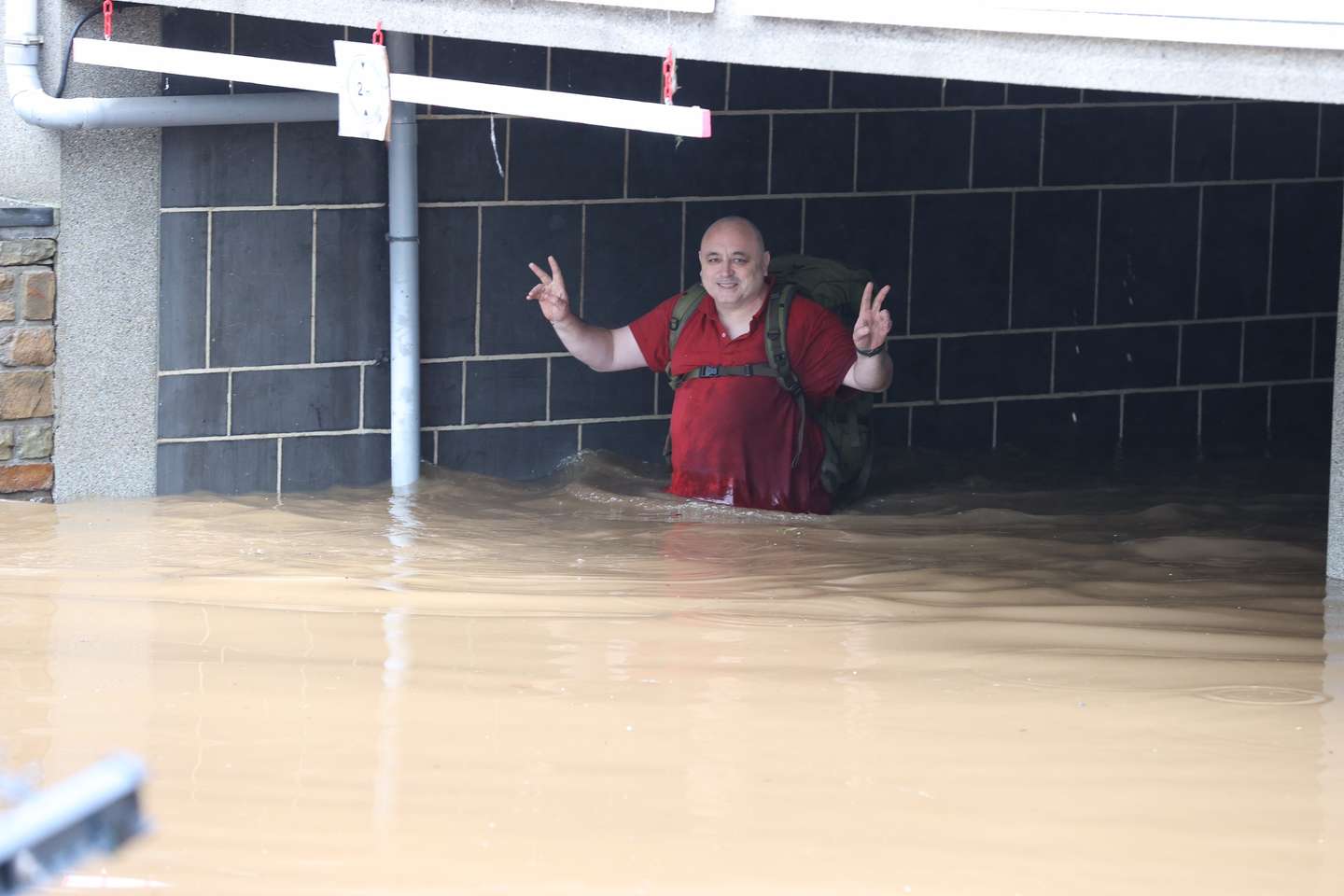 Flooded streets in Belgium as heavy rain in the region