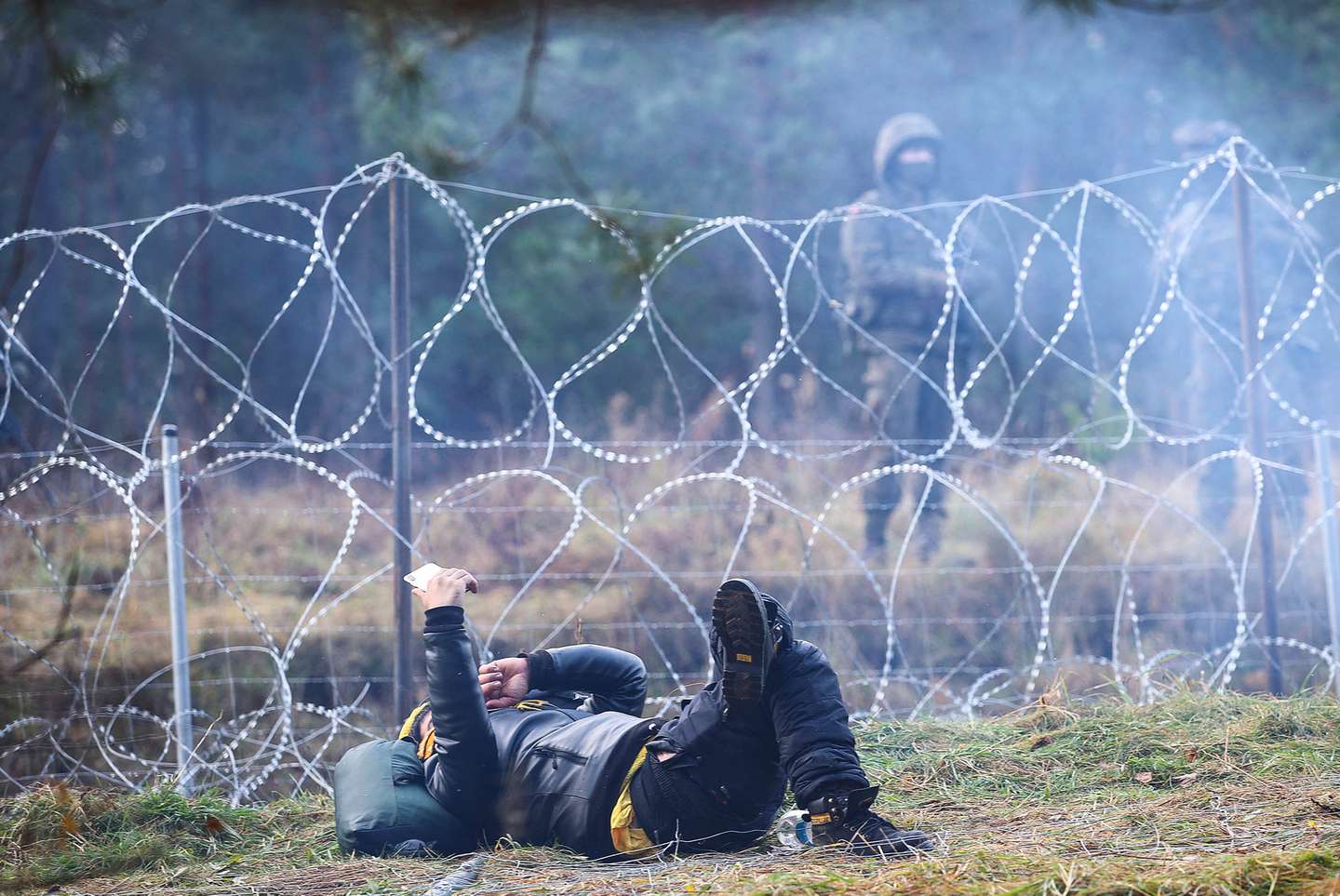 Migrantes encaminhados na fronteira Bielorrússia com a Polónia