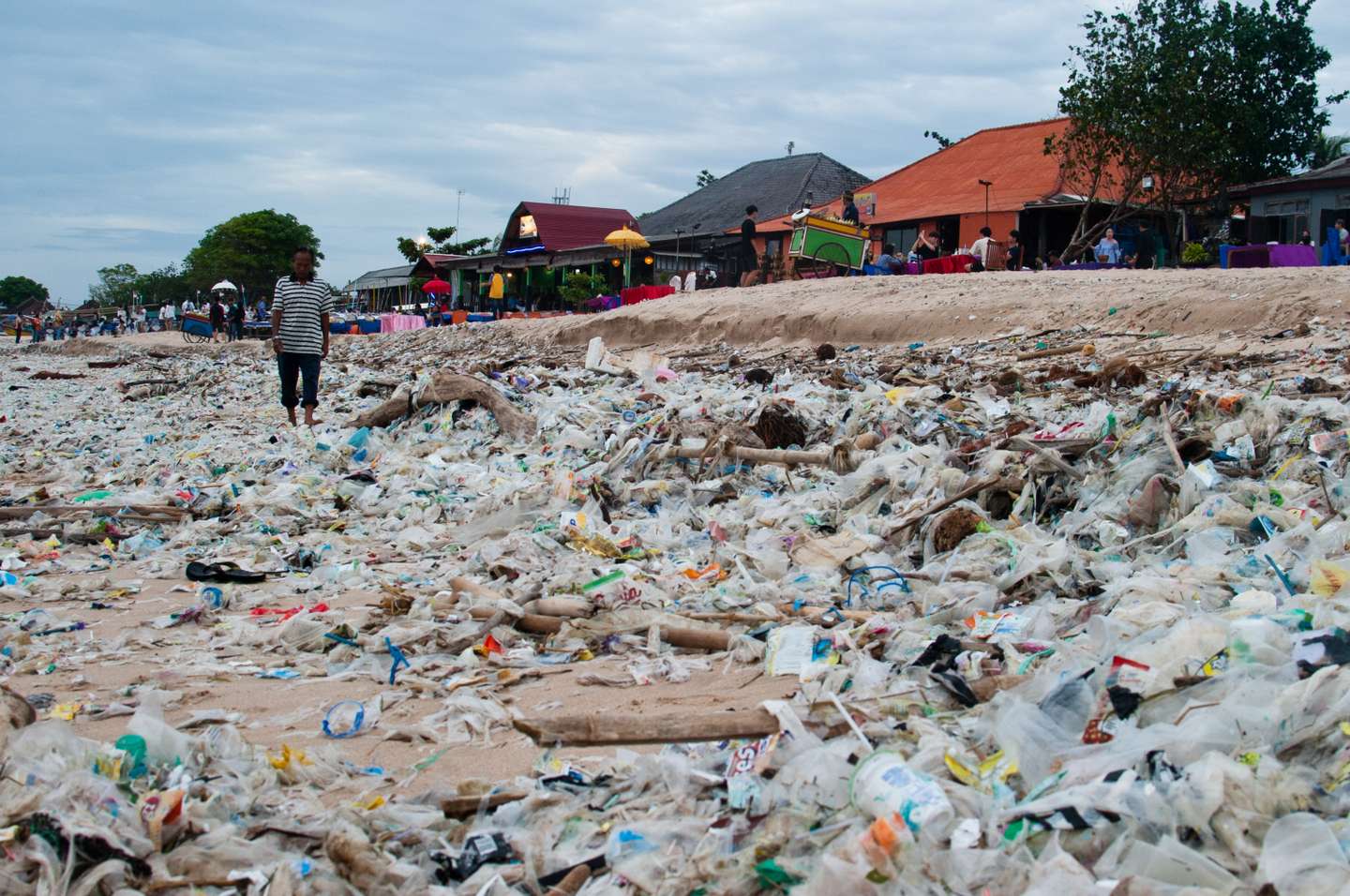 Sand covered garbage in Bali