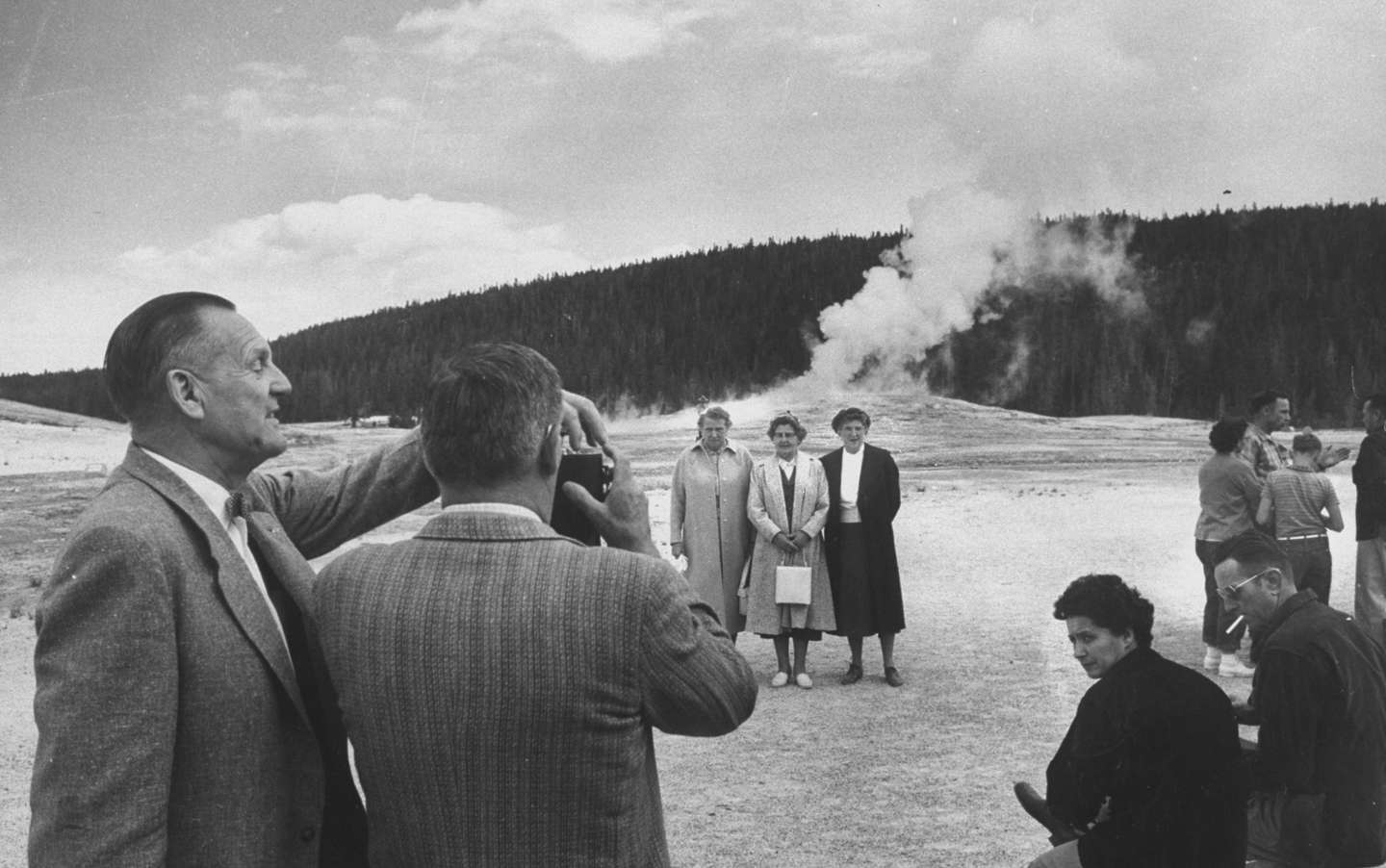 Man talking a picture of a group of wome