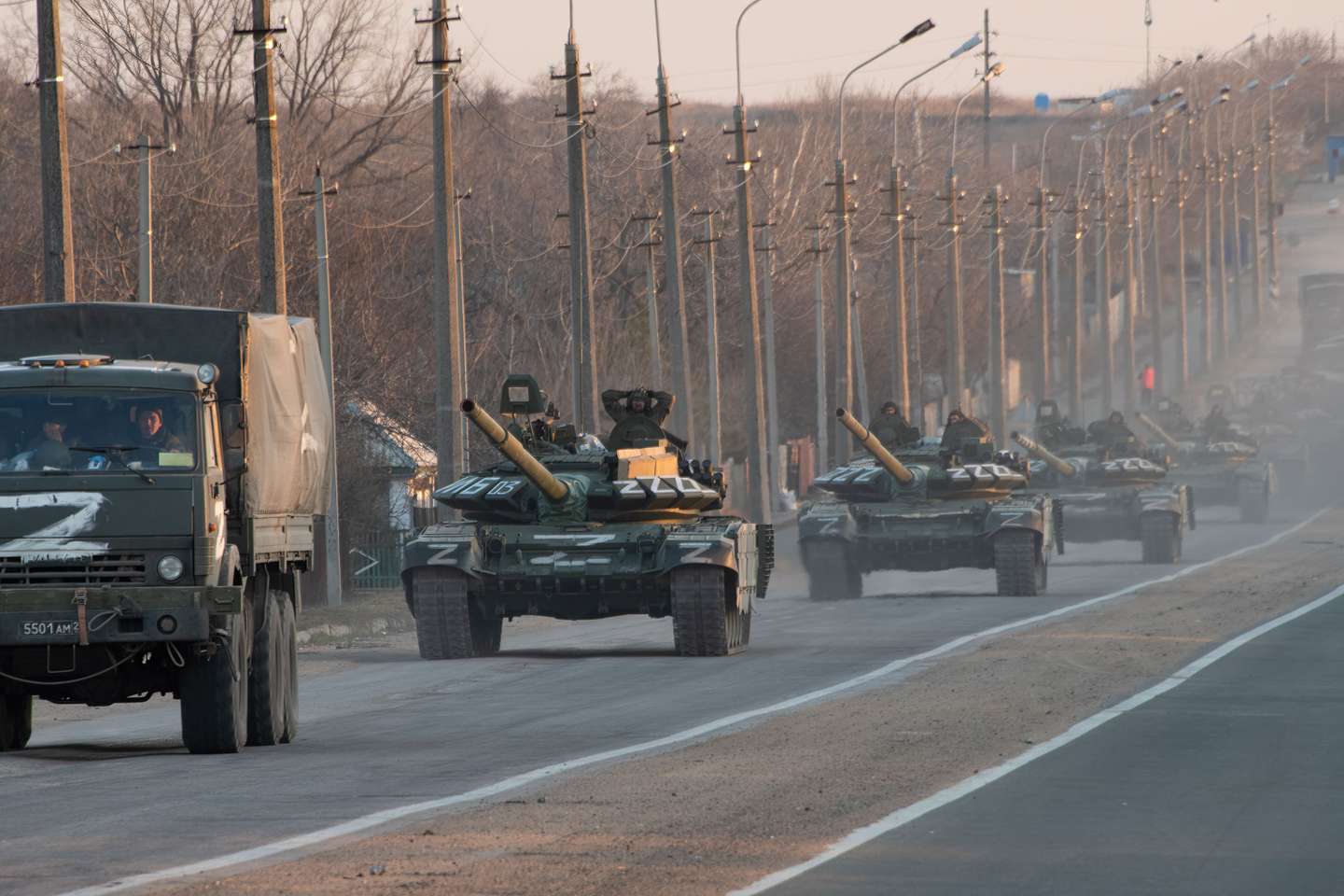 A column of tanks marked with the Z symbol stretches into