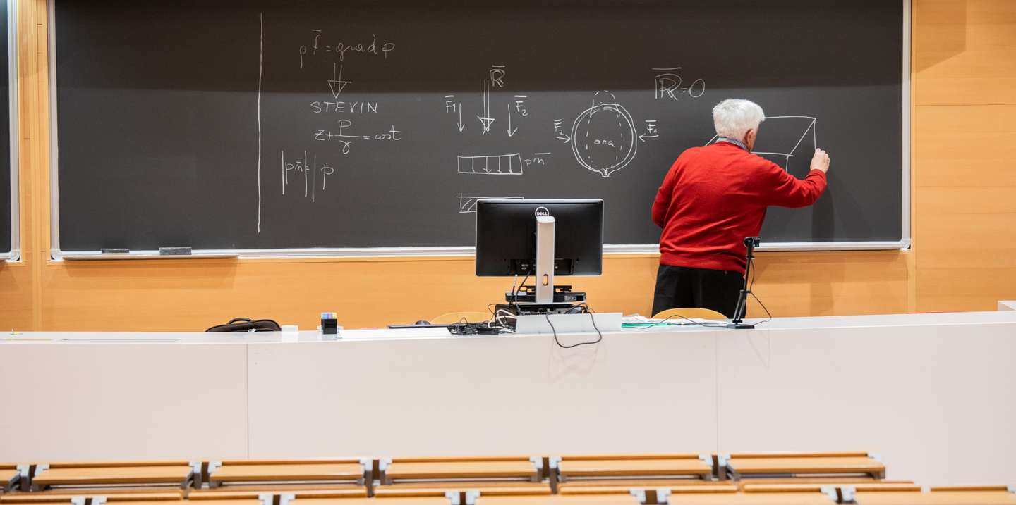 Milan, Hydraulic Lectures transmitted online given by Professor Silvio Franzetti from an empty classroom of the course of Civil Engineering at the Polytechnic of Milan