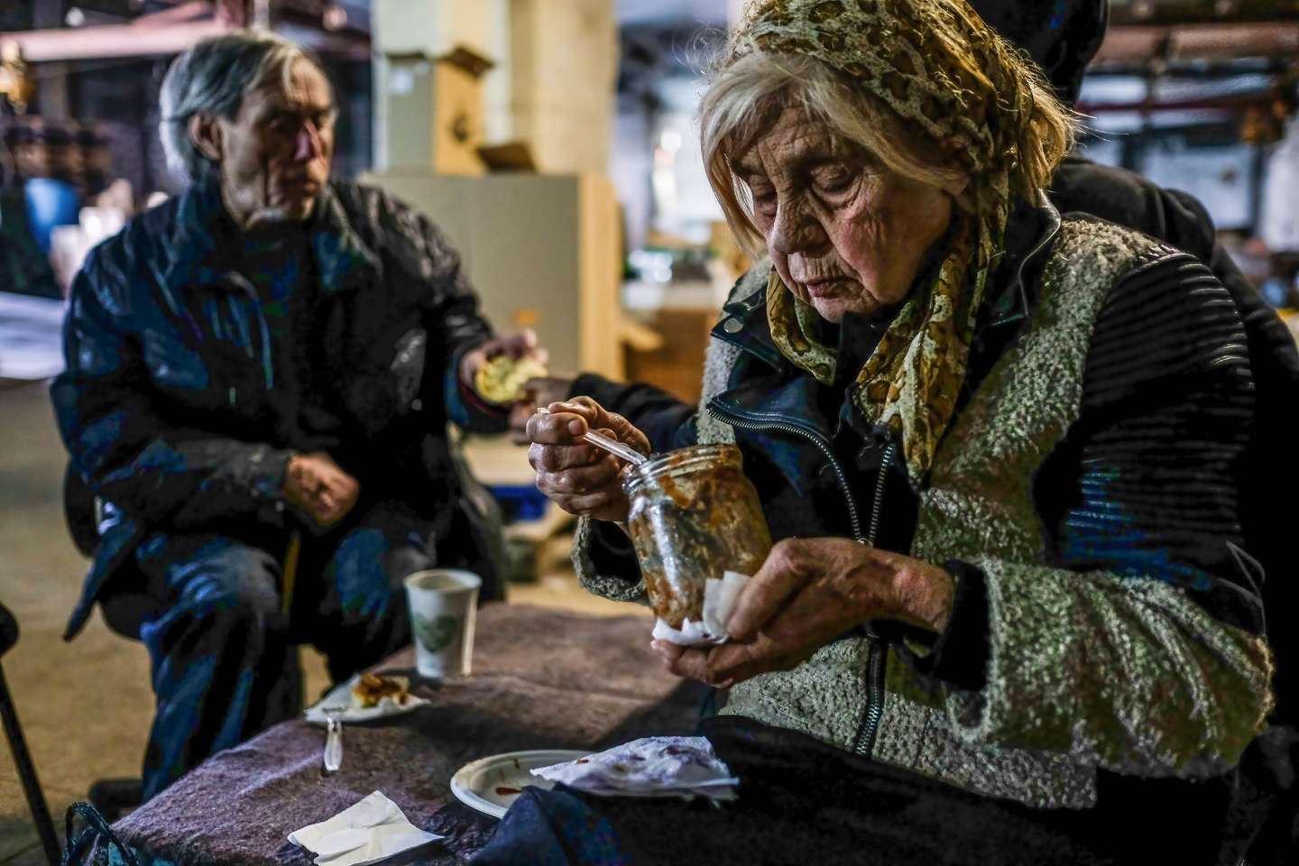 Civilians sheltering inside the center for distribution of