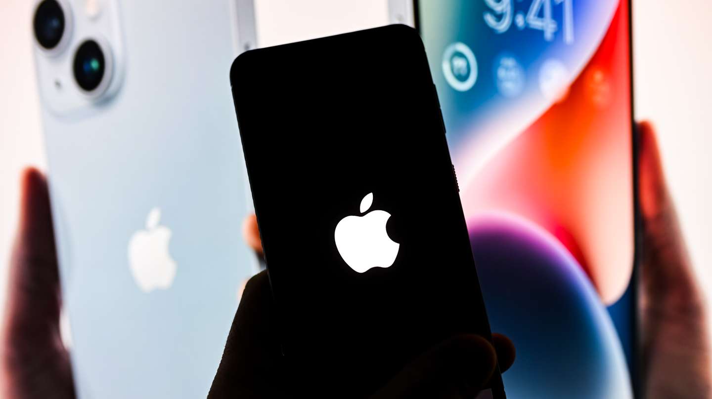 In this photo illustration an Apple logo seen displayed on a