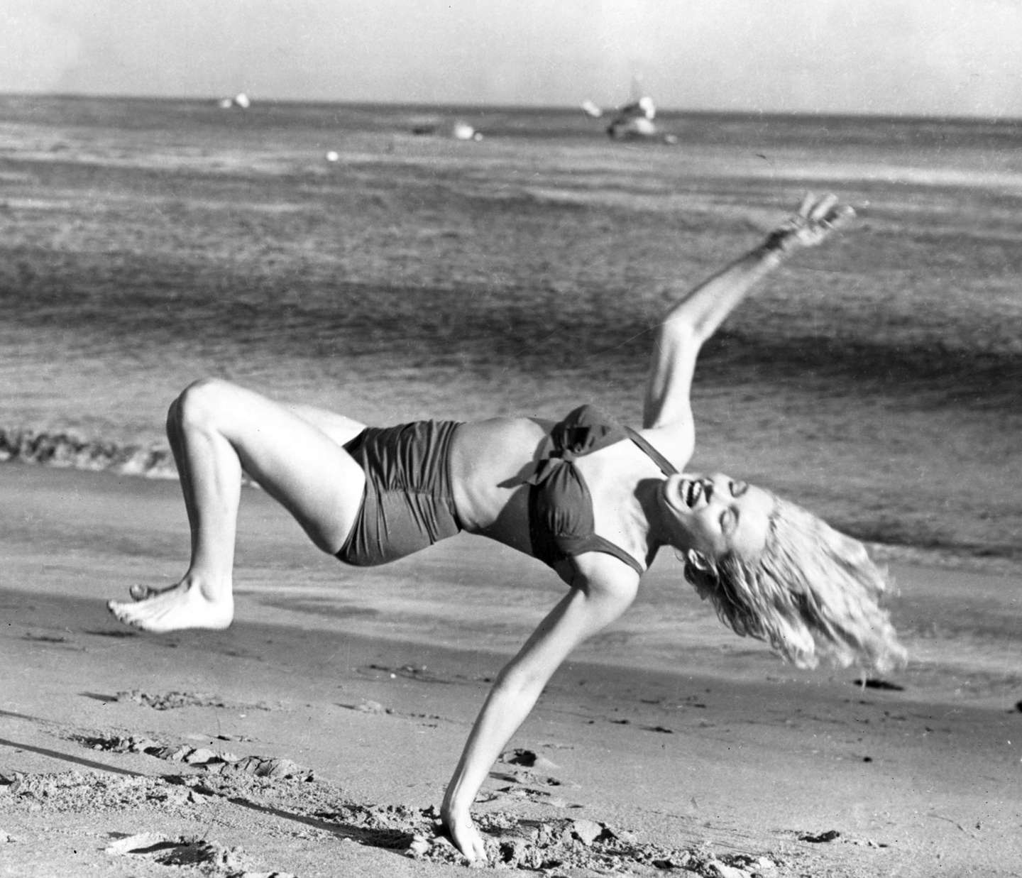 Marilyn Monroe Playing on Beach