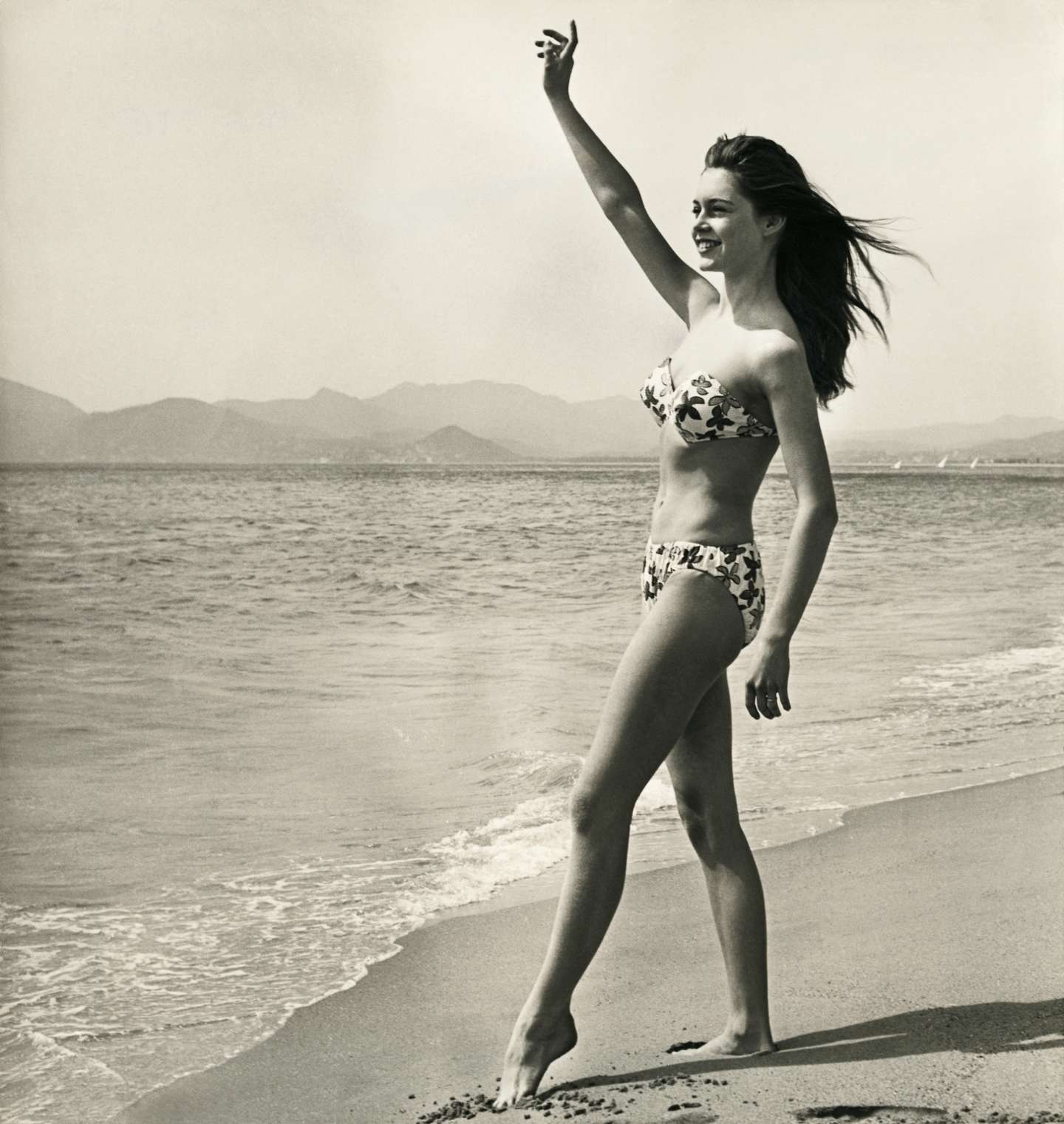 Brigitte Bardot Waving on the Beach