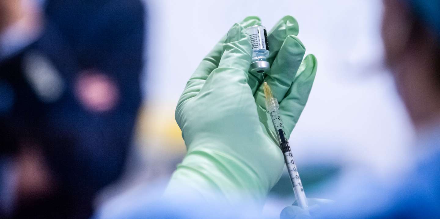 Nurse prepares a vaccination shot against Covid-19.