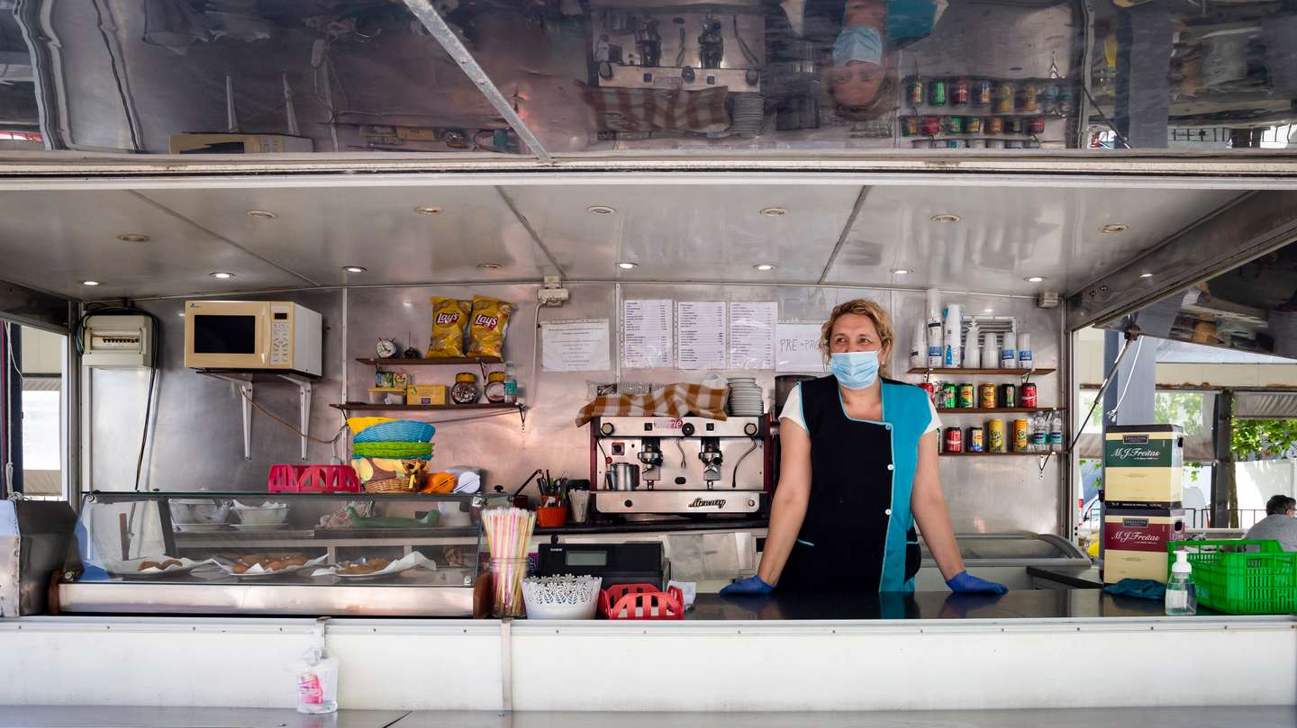 Caravan hop vendor wears a face mask as a preventive measure