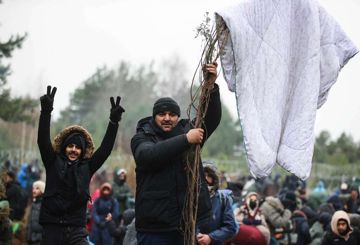 Migrantes encaminhados na fronteira Bielorrússia com a Polónia