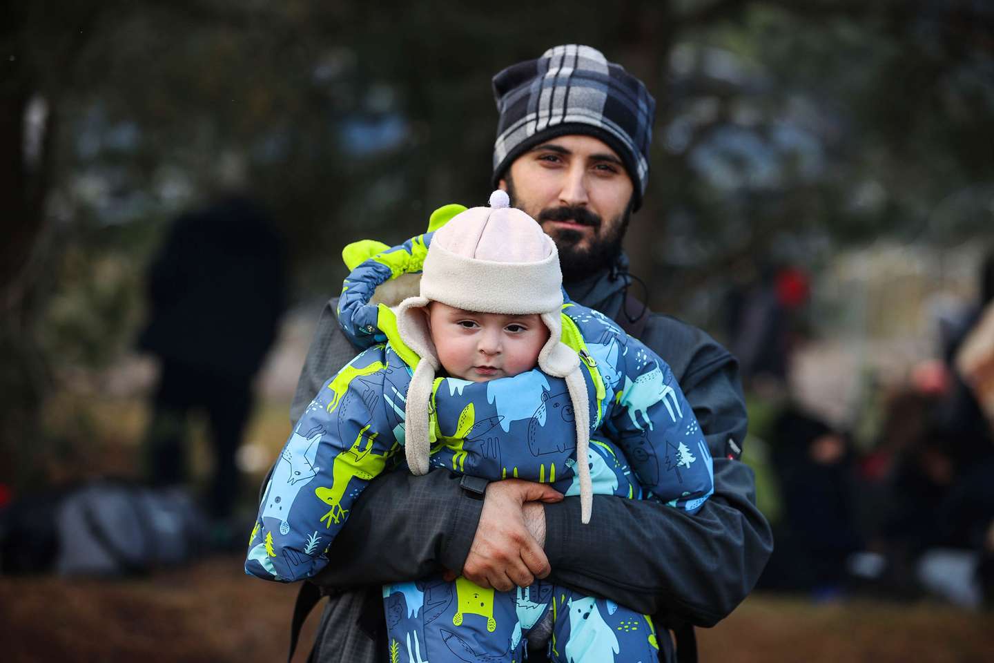 Migrantes encaminhados na fronteira Bielorrússia com a Polónia